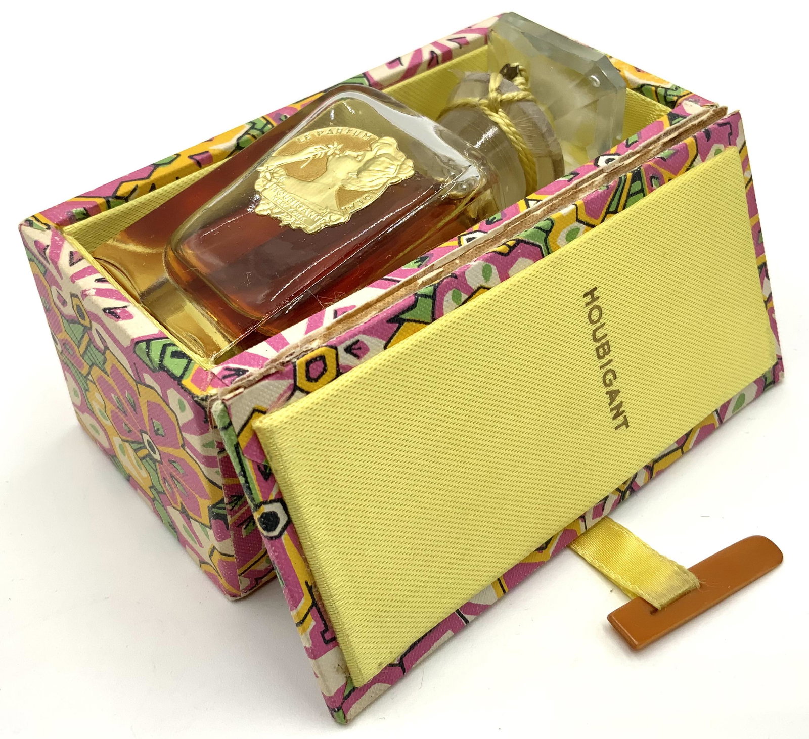 Houbigant Ideal Perfume in a Baccarat Bottle.: The Perfume was Never used. It is in Very Nice condition, and comes with a Houbigant flower-decorated box. It is marked as 1 oz. The Bottle measures 3 1/2" tall.