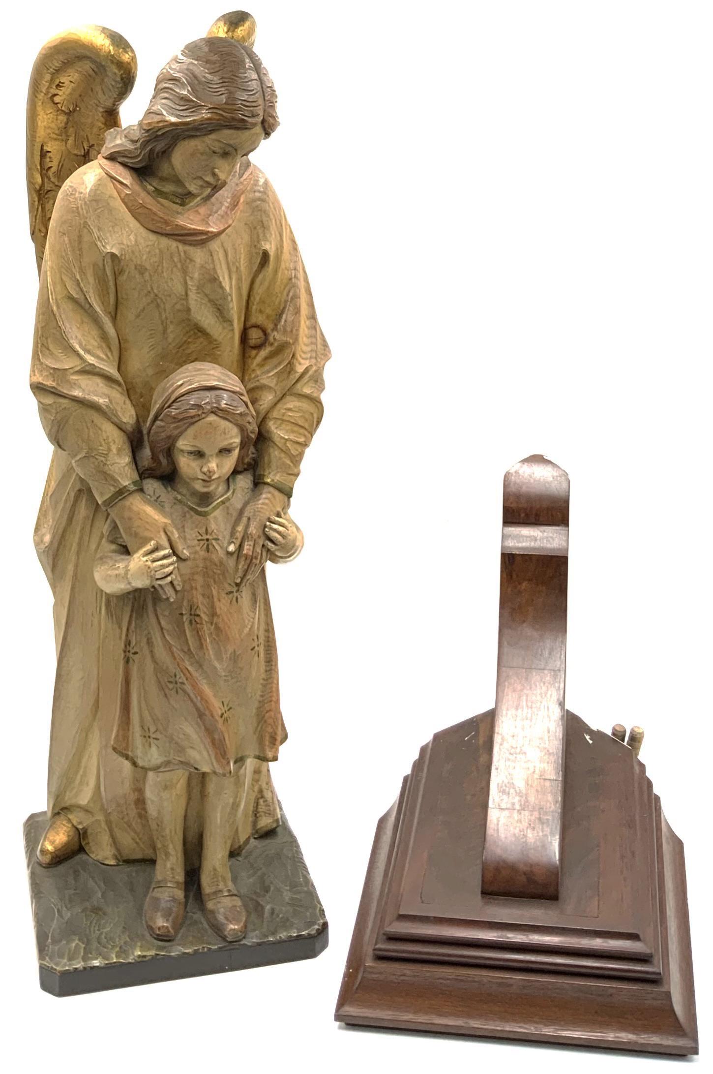Carved Wood Sculpture of Angel Guarding Child. (1 of 2)