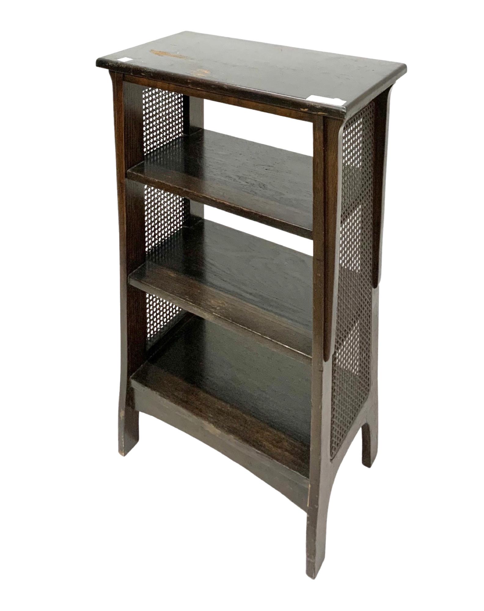 Arts & Crafts Shelf by Shop of the Crafters.: A Nicely-styled Antique Petite shelf with a woven caning panel on each side. This has a tag from The Shop of the Crafters in Cincinnatti, owned by Oscar Onken, and opened in 1904. The shelf is in unre