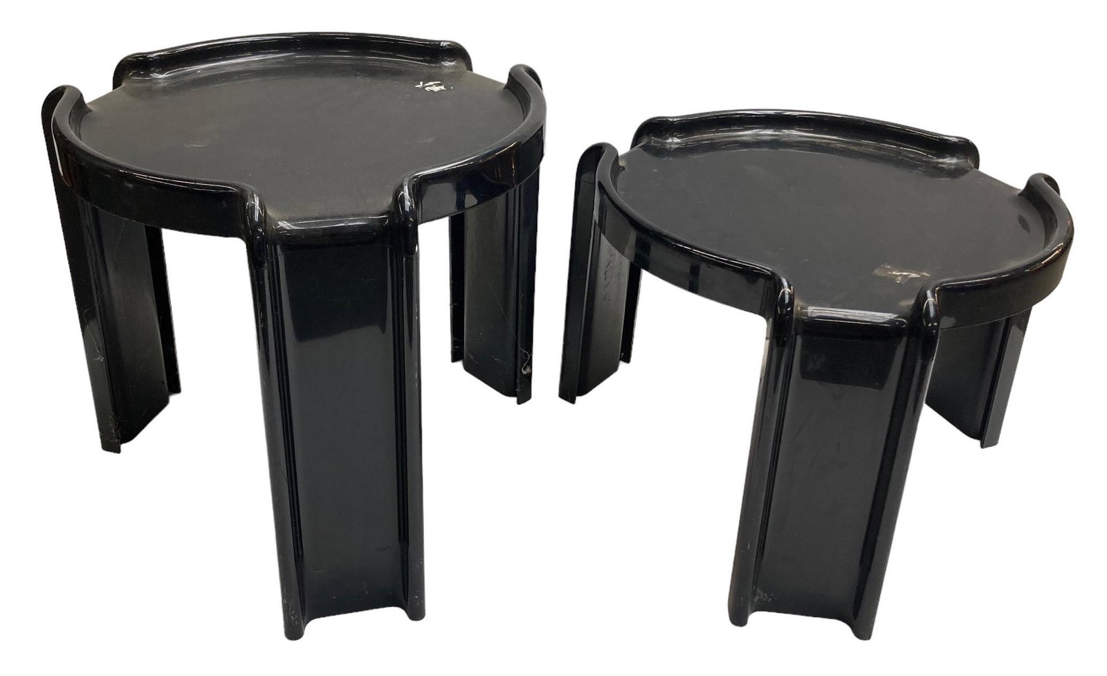 Pair of Mid-Century Modern Kartell-Milano Tables.: They are designed by Giotto Stoppino and made in the USA by Beylerian Ltd. - Both tables are in used condition, with even scratching, and in need of restoration. They measure 18" in diameter and 13 1/