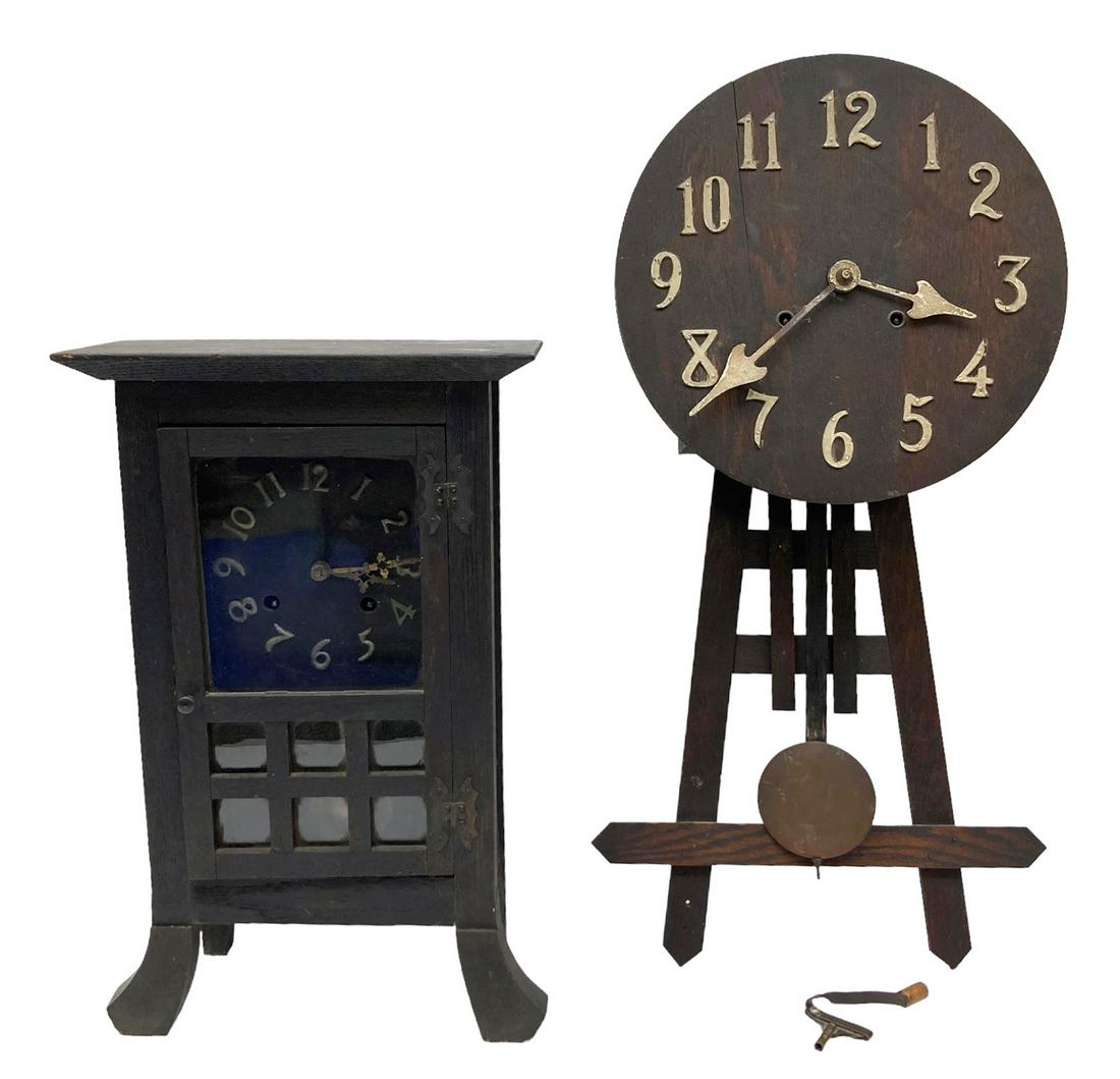 Lot of 2 Mission Style Clocks.: The first is a round oak mission wall clock by the National Clock Co., Chicago. It Comes with a pendulum and key. The second is a mantel clock in a San Pedro style made by the New Haven Clock Company.