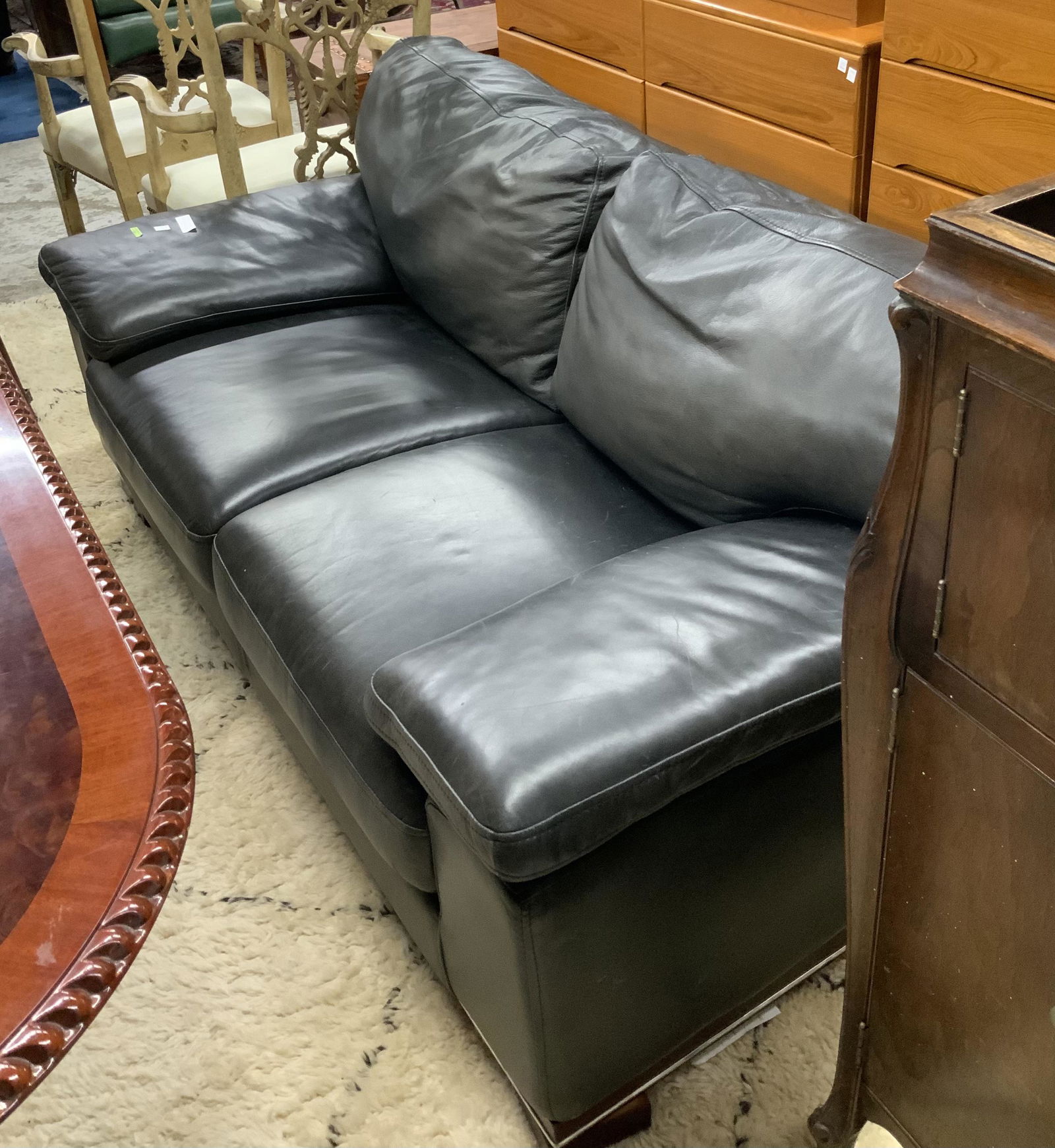 Black Leather Italian 2-Cushion Sofa. (1 of 2)