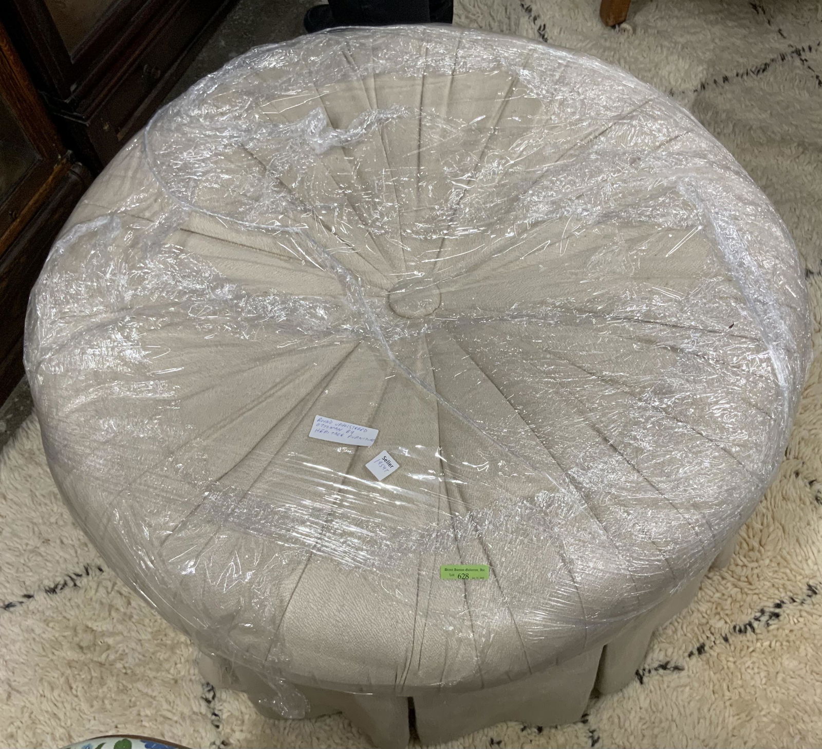 Round Upholstered Ottoman by Heritage Furniture. (1 of 1)