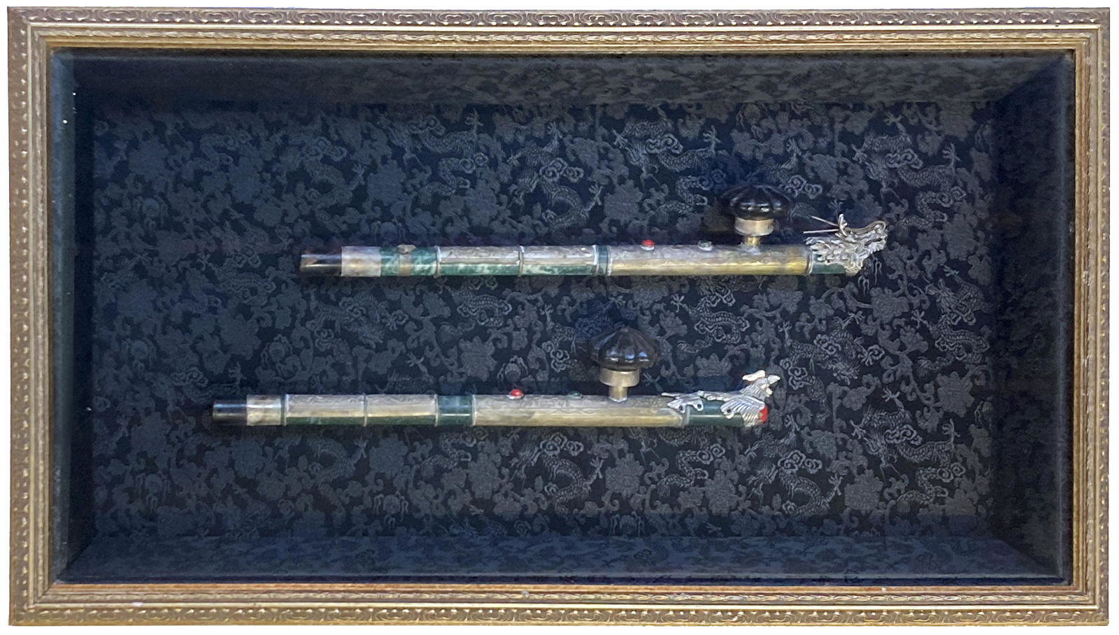 Display with Two Metal Asian Opium Pipes. (1 of 2)