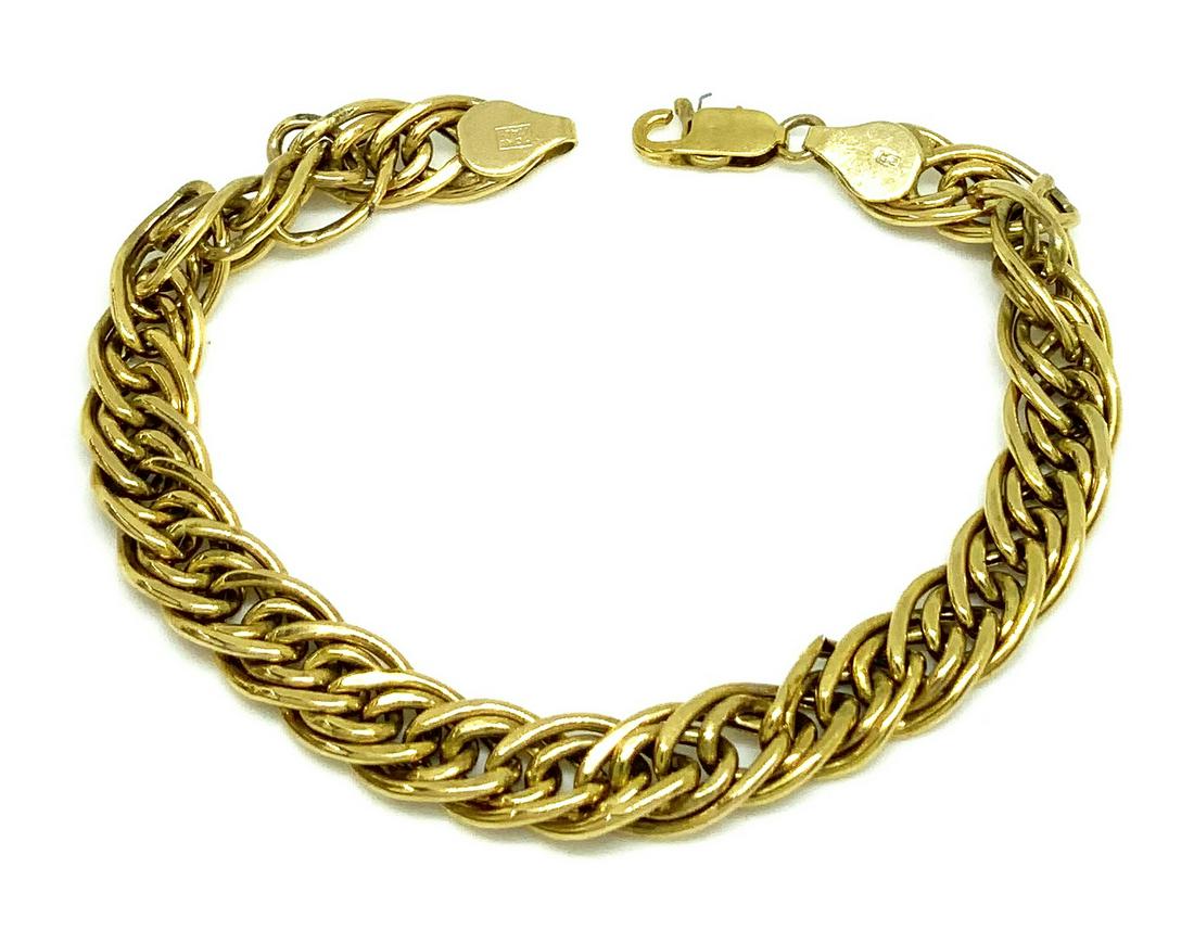 10K Gold Bracelet.: The Bracelet is Slightly Damaged in One Spot. It measures 7 1/8" Long and 5/16" Wide. It weighs 3.6 Pennyweight, or 5.5 Grams. In-House Shipping is Available. Please Contact us Post-Auction regarding 