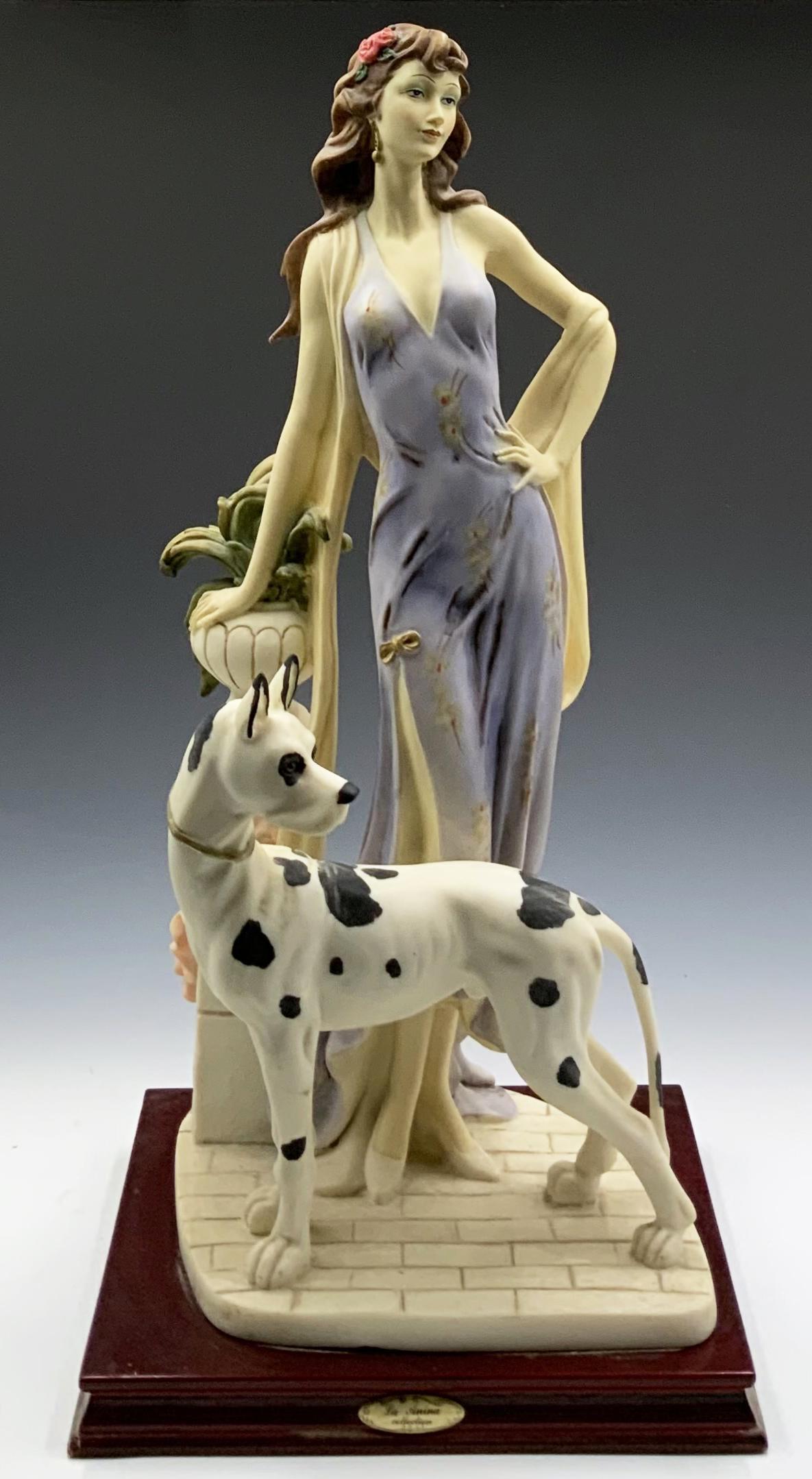 La Anina Figurine of Woman w/ Great Dane. (1 of 3)
