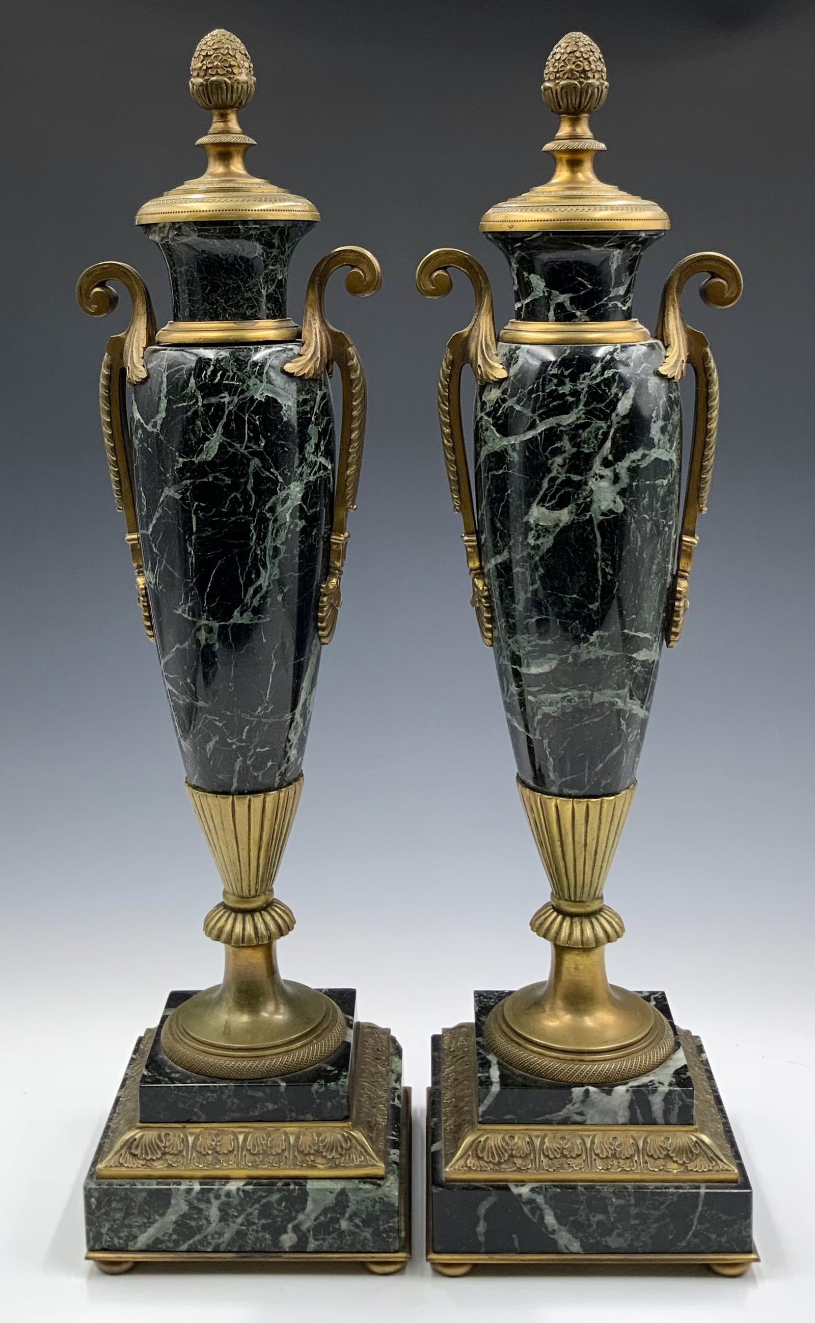 Pair of Bronze and Black Marble Urns. (1 of 3)