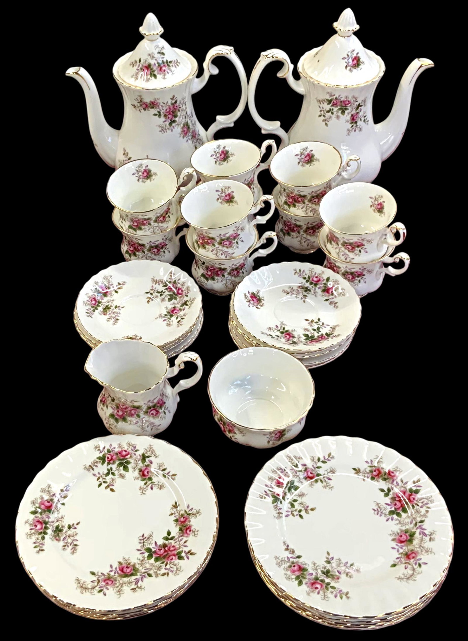 Royal Albert "Lavender Rose" Bone China Set.: The Royal Albert set includes 36 pieces- 2 coffee pots, 10 demitasse cups, 10 saucers, 12 bread plates, a creamer, and a waste bowl. The set is in Very Nice condition. The largest pieces in the lot me