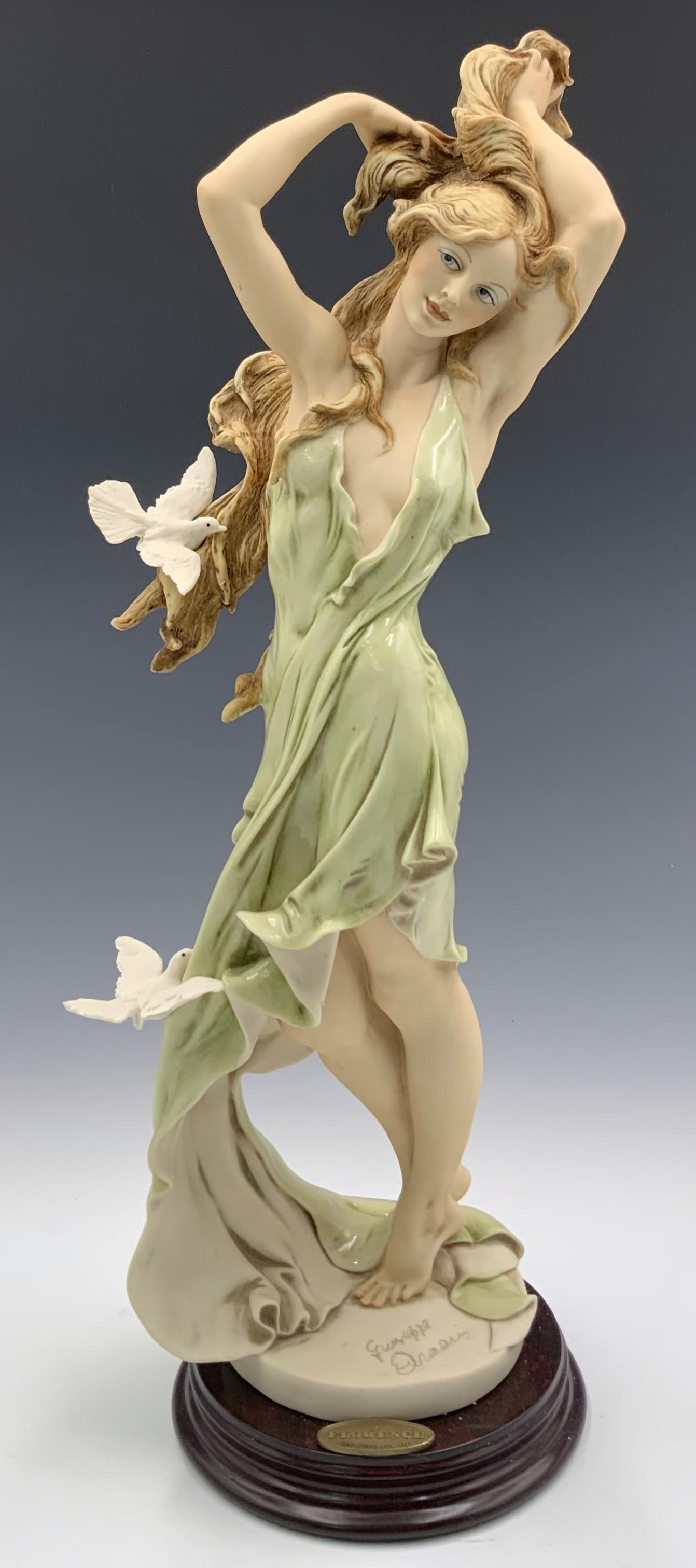 Giuseppe Armani Figurine of Woman w/ Doves. (1 of 3)