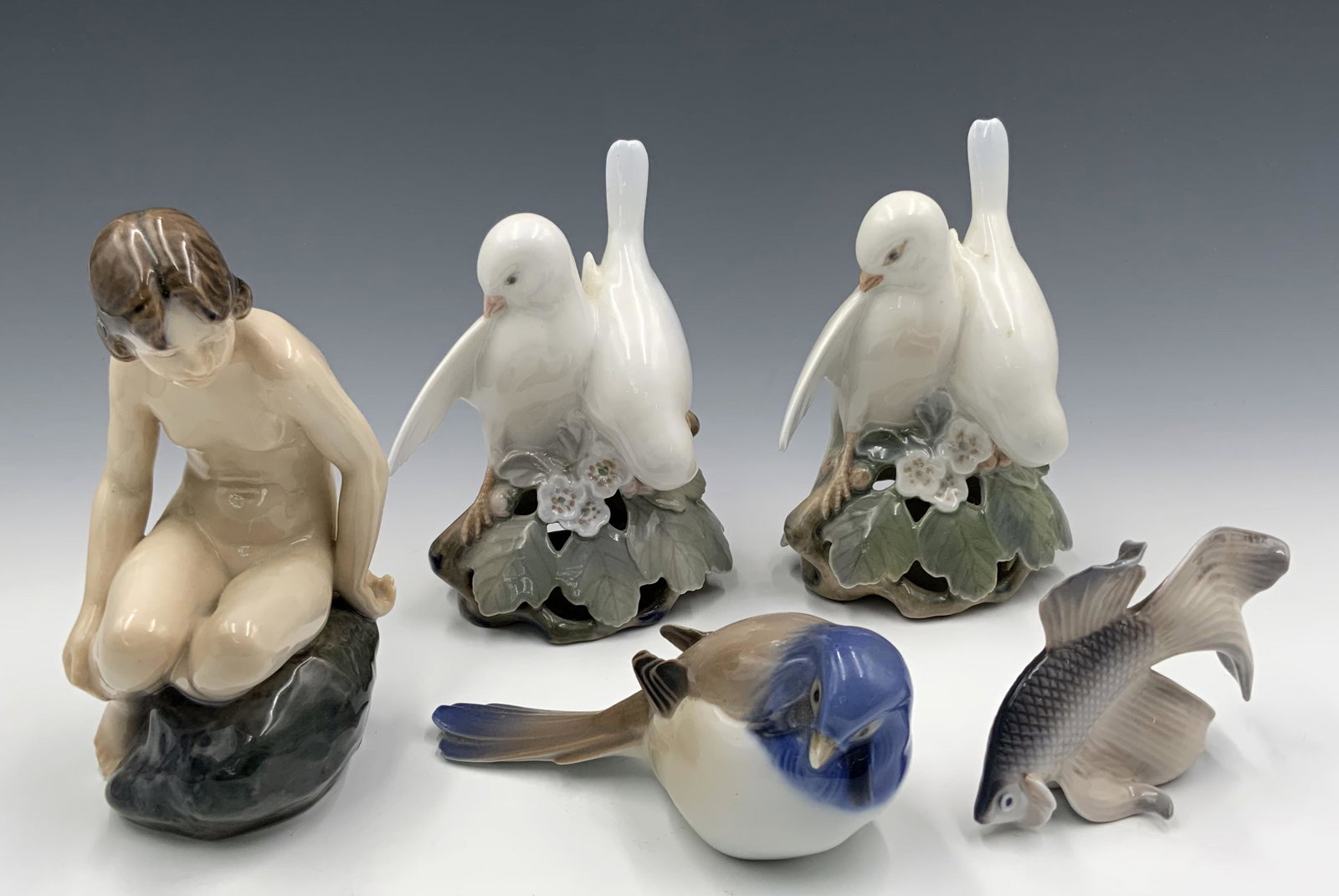 Lot of 5 Danish Porcelain Figurines- Birds, etc.: Most are marked as Royal Copenhagen. The small bird is Bing & Grondahl. It has a Chip on both the beak and its tail. The other figures look to be in Very Nice condition. One of the white birds has a s