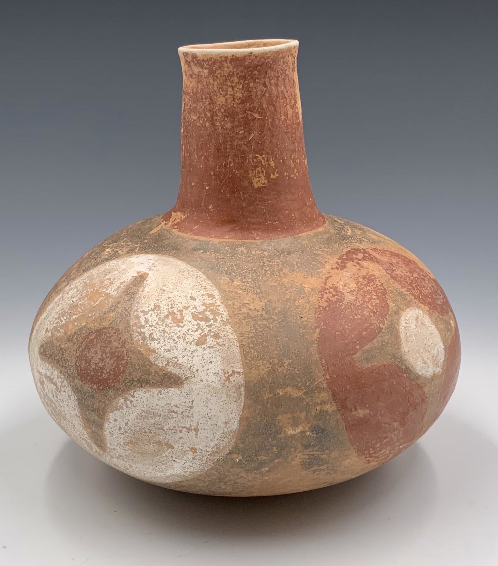 7" Quapaw Style Pottery Vessel.: No signature has been found on this piece. There is some Paint Loss; overall, the piece looks to be in Good condition. There is a small hole in the bottom, from when the item was age-tested. The resul