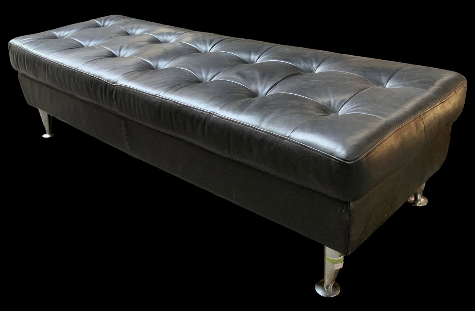 Black Tufted Bench w/Aluminum Legs.: The Leather is in overall good condition, with some paint residue on one end. The Bench Measures 17" tall, 65" wide x 22" deep. Third-party freight shipping or personal pickup is required.