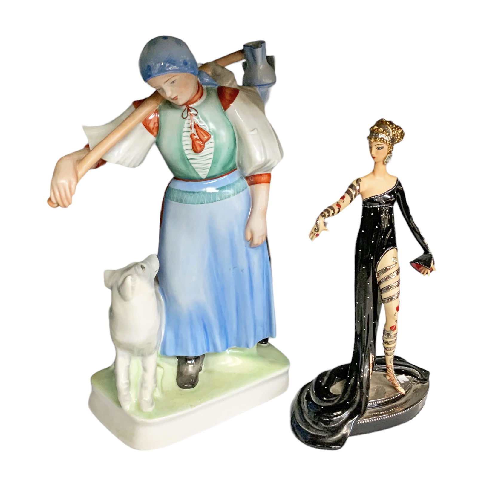 Lot: Zsolnay Figurine & As Is Erte Figurine.: The Zsolnay Figure is of a Woman with a Dog. It is in Good Condition, and measures 12 3/4" Tall. The Erte Figurine has an index finger Missing. It is titled "Pearls and Rubies" by House of Erte. In-ho