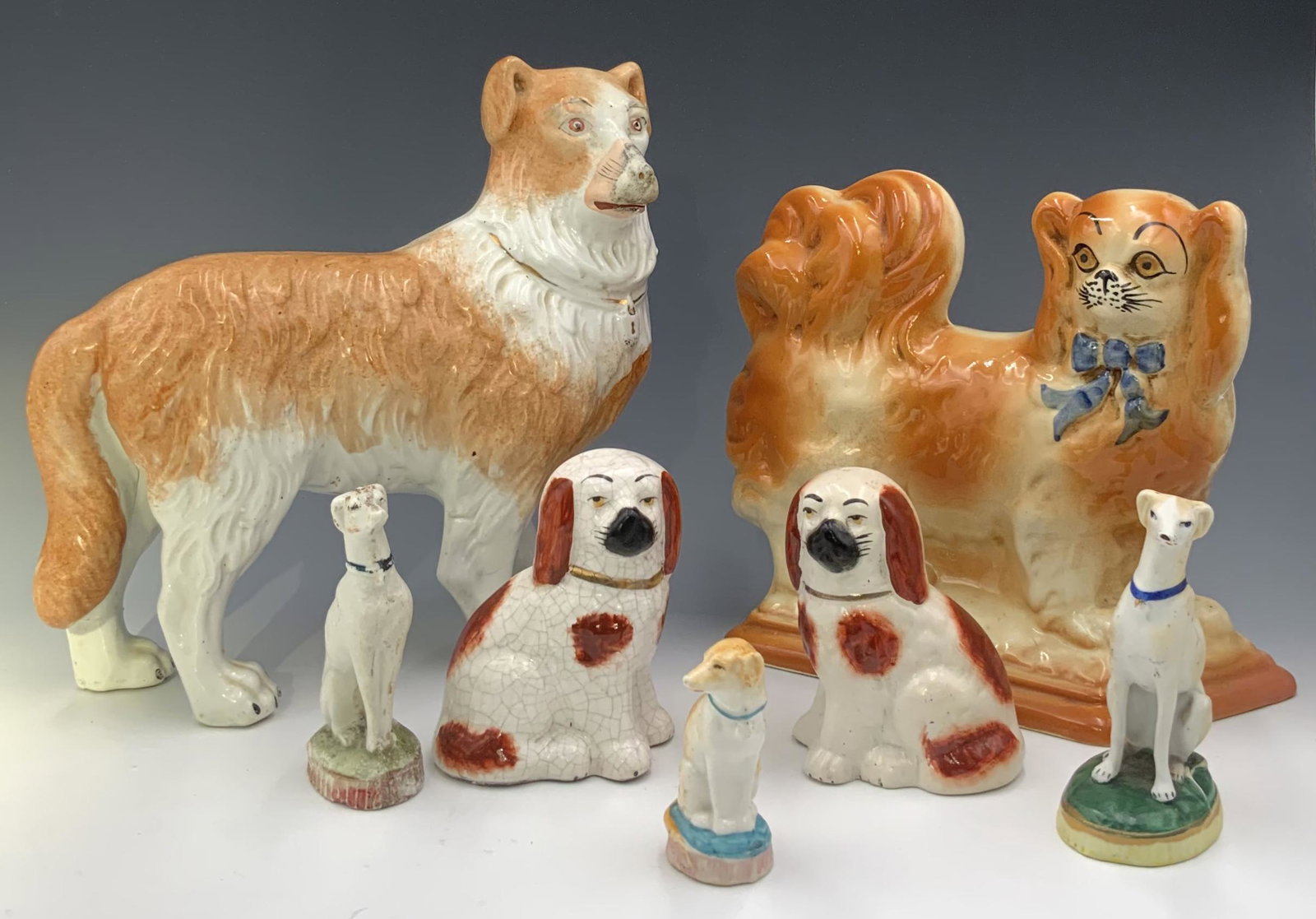 Lot of 7 Assorted Staffordshire Dog Figures. (1 of 5)