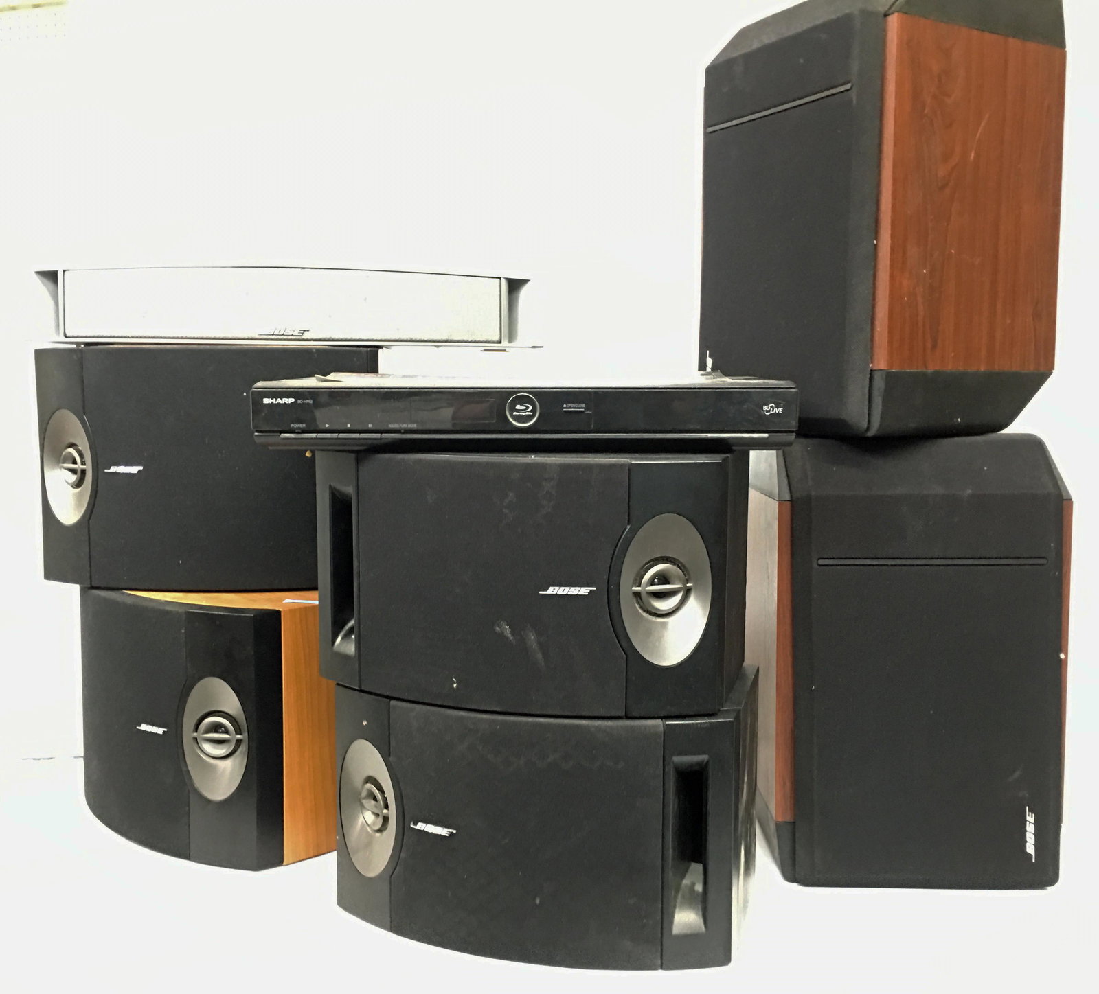 Lot: 7 Bose Speakers, Blu-Ray Player.: These items have not been tested. There are three pairs of Bose speakers (301 Series IV, 301 V, and 201 V), as well as a single Bose speaker (VCS 10). The Blu-Ray player is made by Sharp. The largest