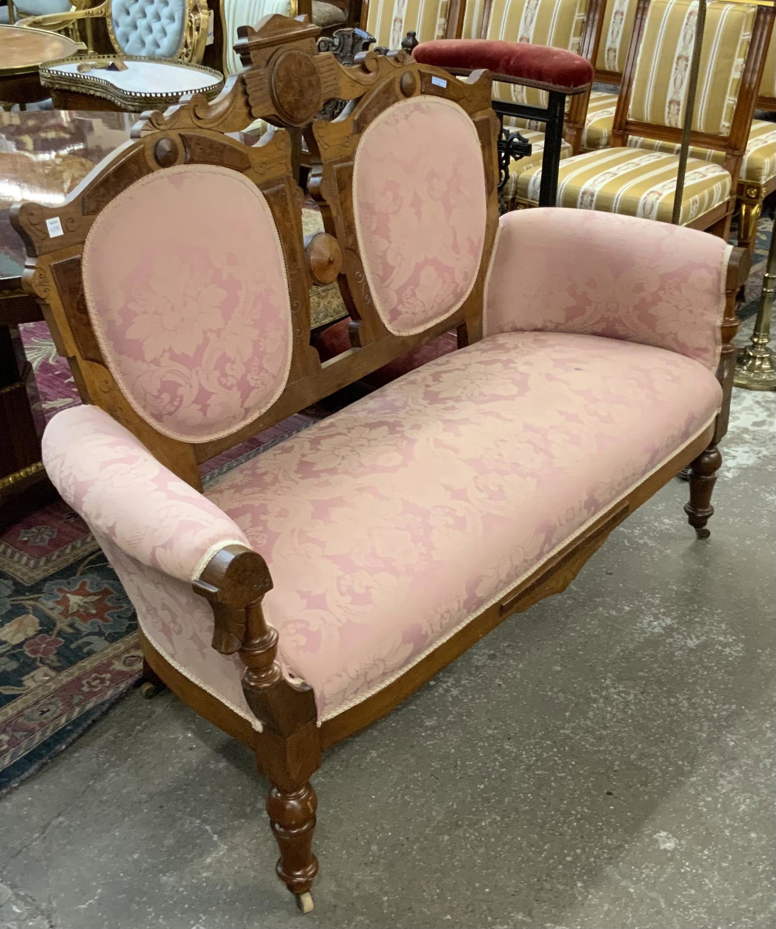 Victorian Upholstered Love Seat.: The Love seat is in Very Good Condition for its age. There is one Dark spot on the seat upholstery. It measures 58" Wide, 43" High, and 25" Deep. Third-party freight shipping or personal pickup is req