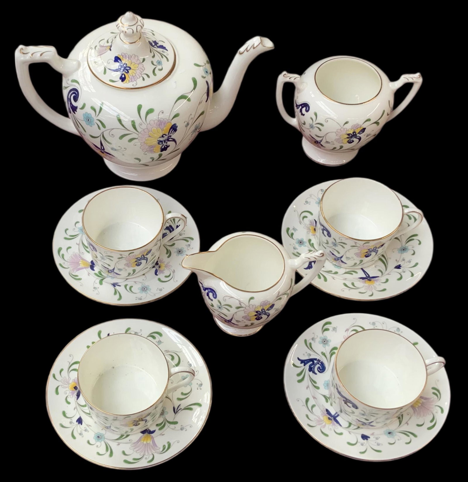 Coalport Pageant Bone China Tea Set.: The Place Settings Serve 4. The set Includes a teapot with lid, a creamer, a sugar bowl, four teacups, and four saucers. The Set looks to be in Very Nice condition. In-House Shipping is Available. Ple