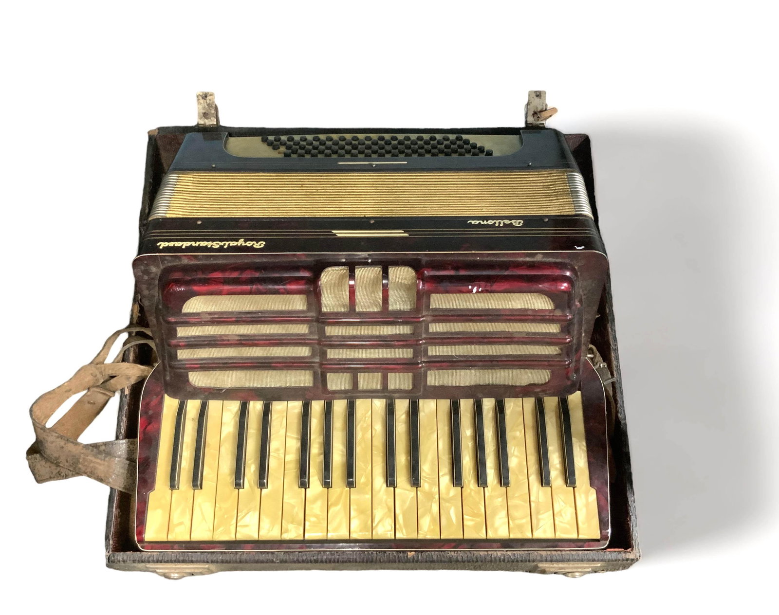 Bellona Royal Standard Accordion with Case.: It is Untested, though it does make noise. It is missing a button, and has some tears in the screen. There is a fair amount of dust, and some Scratches. The case has a fair amount of Wear, and is not 