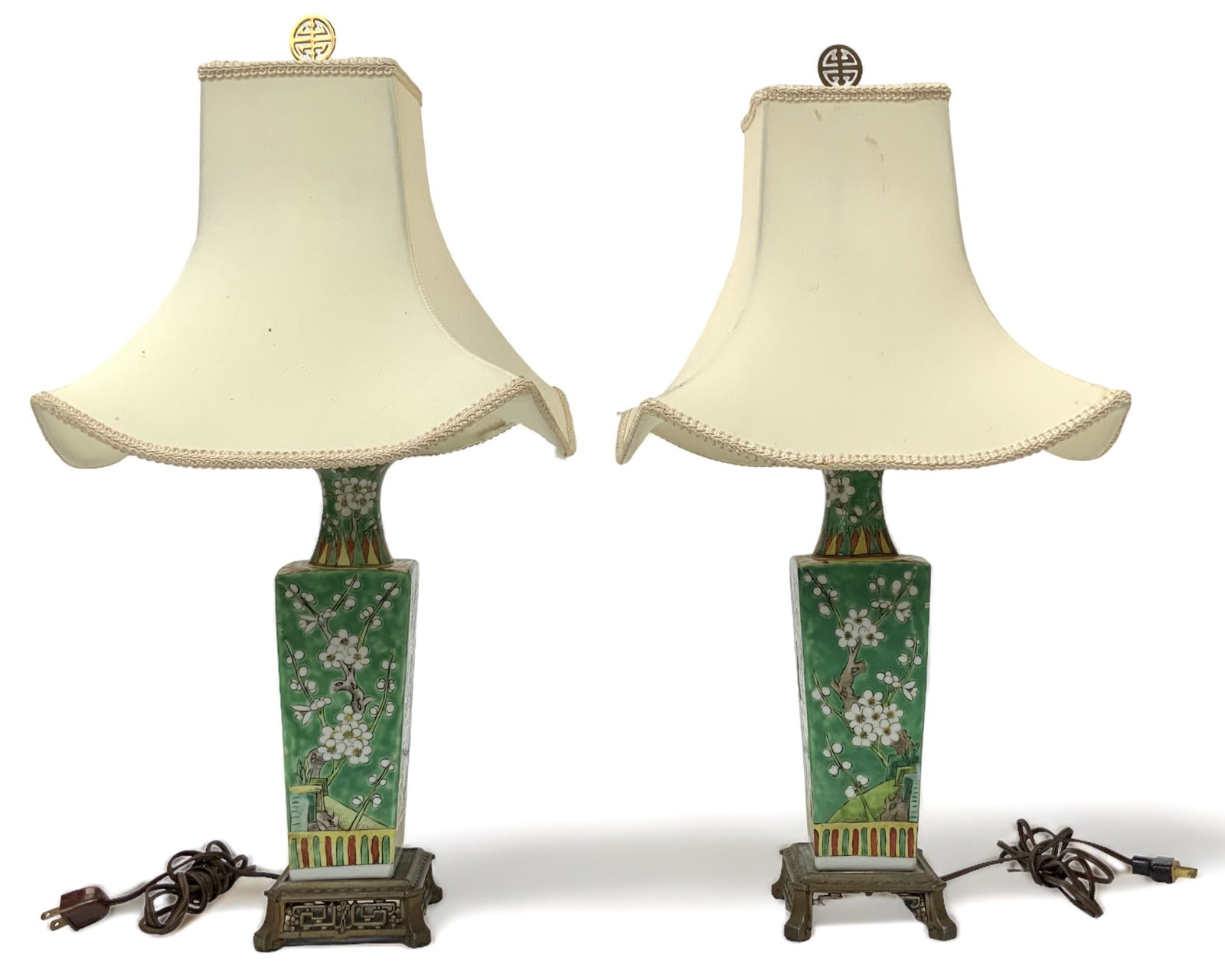 Pair of Green Floral Chinese Porcelain Lamps.: The Porcelain Portions of the Lamps are in Good Conditon. There is a bit of Ornamentation missing from the base of one of the lamps. Also, the inside area of both shades are a bit torn up. The lamps a