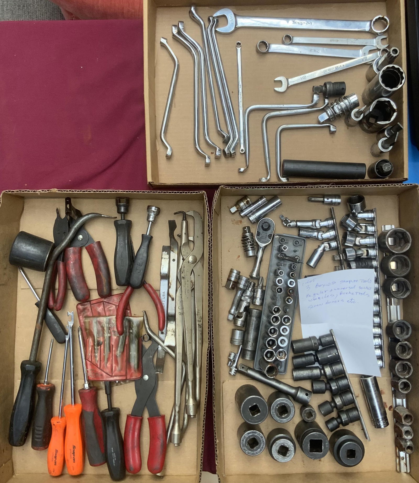 3 Boxes of Snap-On Tools.: This lot of Snap-On tools contains regular and universal socket wrenches, brake tools, screw drivers, and more. The lot is in used condition, and several pieces are stripped or rusting. In-house shipp