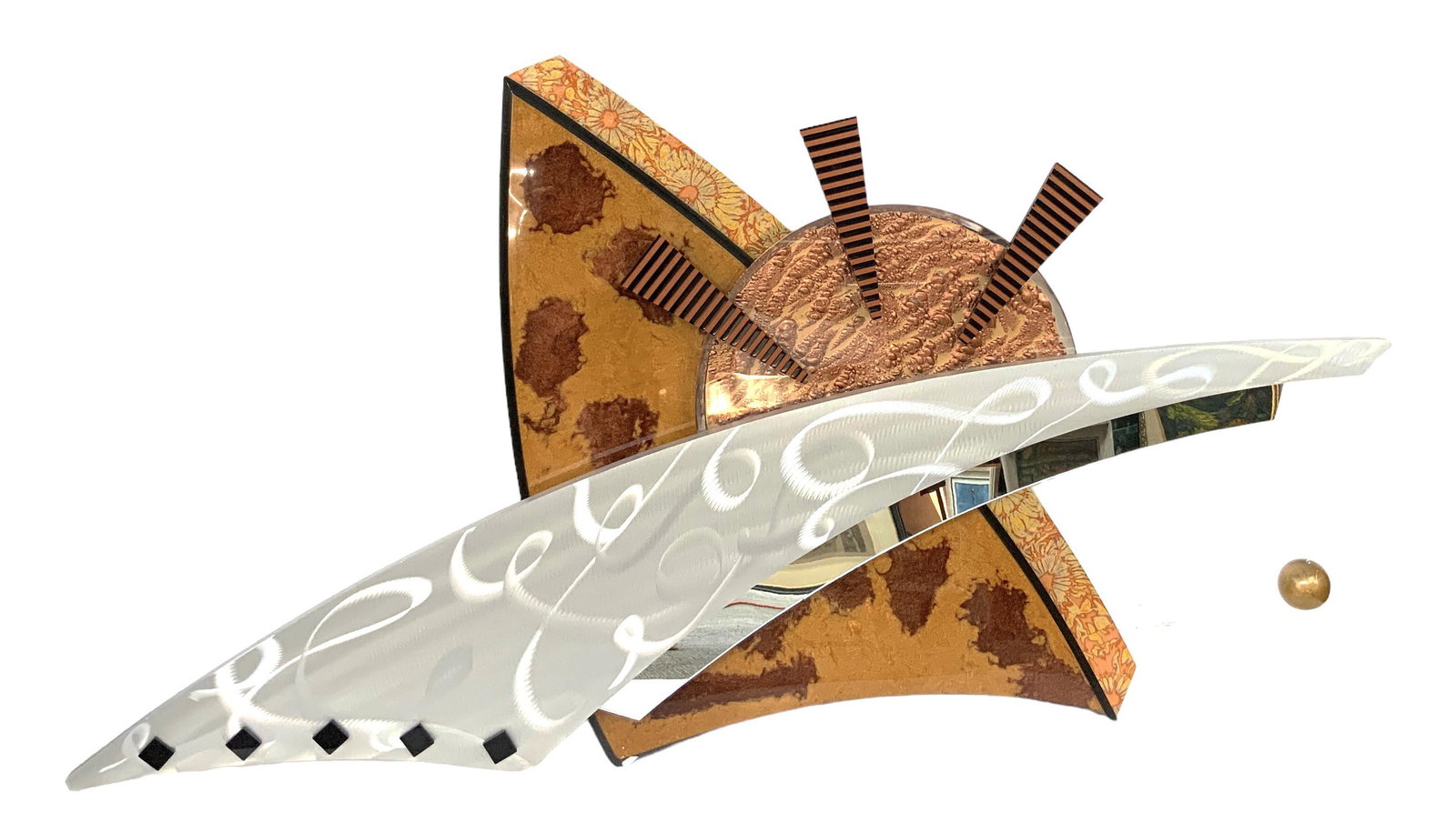 Abstract Mirrored Wall Sculpture by Shlomi Haziza.: This abstract wall sculpture has a gold-toned base with silver-tone and mirrored decorations. It is made out of acrylic and painted wood. It has a hanging gold-tone orb. It is unsigned. There is a scr