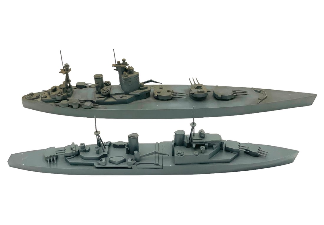 Lot of 2 Framburg Recognition Ships- Fiji & Nelson: The smaller ship reads, "Fiji Class (Brit.-CL) H.A. Framburg & Co- Chicago 12-43" on the underside. The larger ship reads, "Nelson Class (Brit.-BB) H.A. Framburg & Co- Chicago 12-43". It measures 17" 