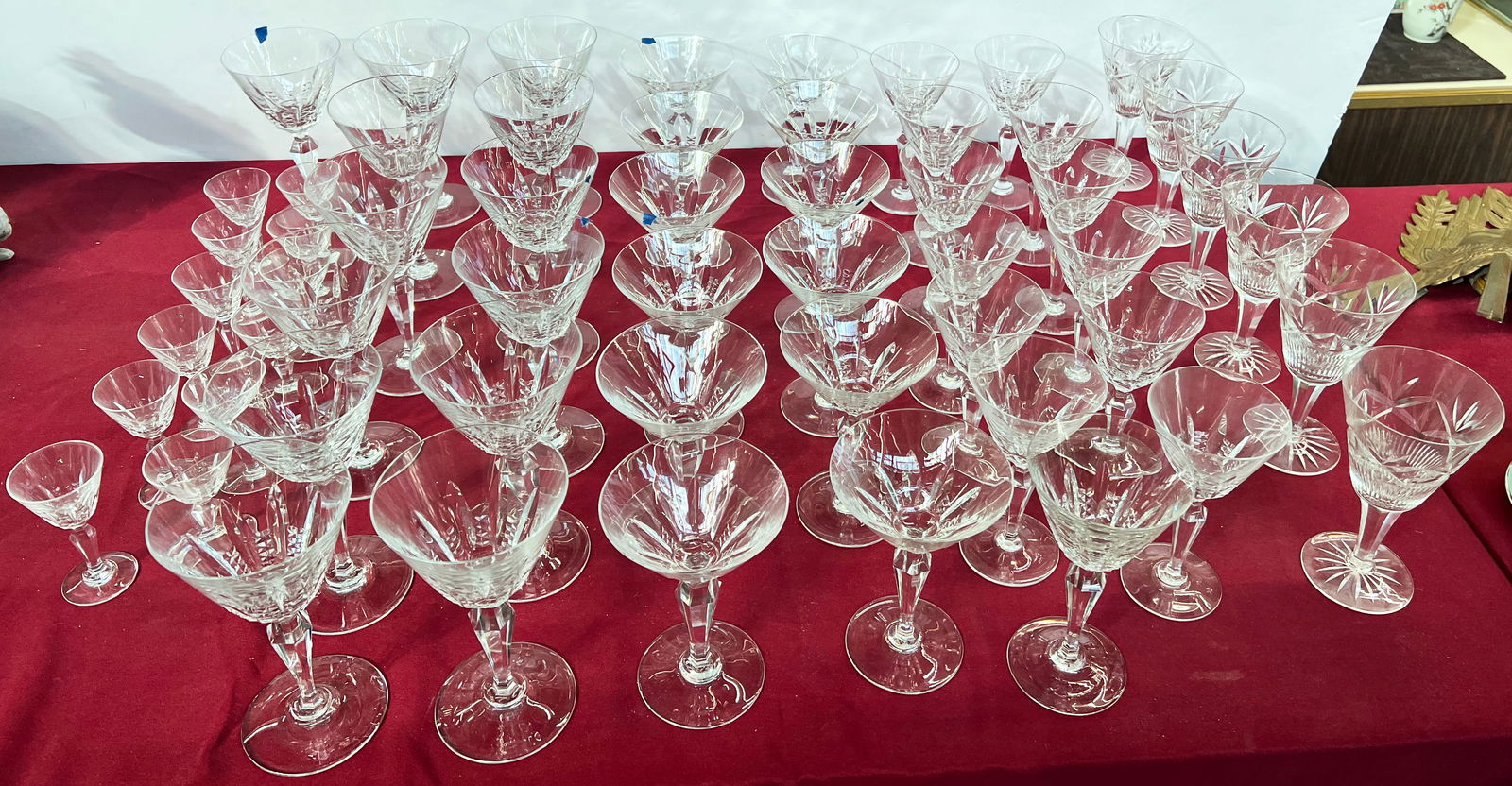 Mostly Baccarat Crystal "Austerlitz" 50 Pc. Set.: There are Stemware and Goblets of various sizes, mostly marked "Baccarat" on the underside. Included are water goblets, martini glasses, cordial glasses, and wine goblets. Several pieces have Chipped