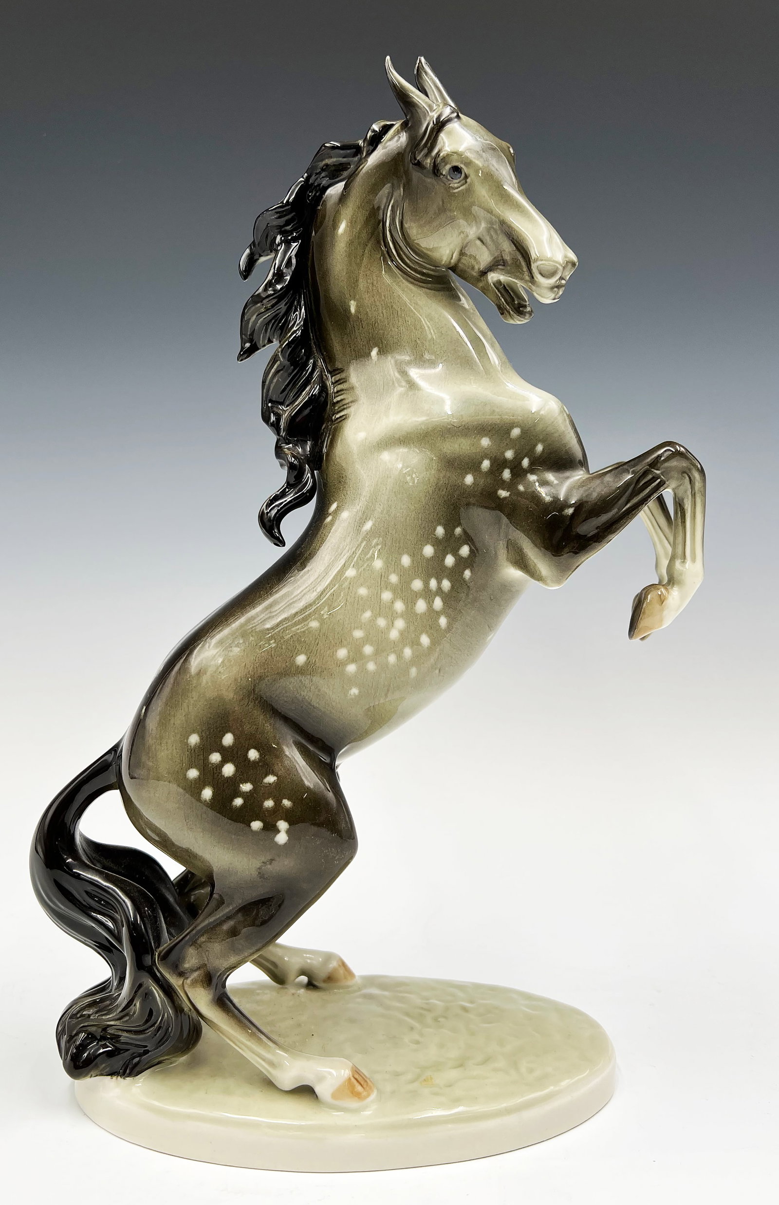 Royal Dux Painted Porcelain Horse Figurine.: It is black, white, and gray, standing on its rear legs. The Figure looks to be in Very Good cosmetic condition. It Measures 12 1/4" tall and 7" long. In-House Shipping is Available. Please See our We