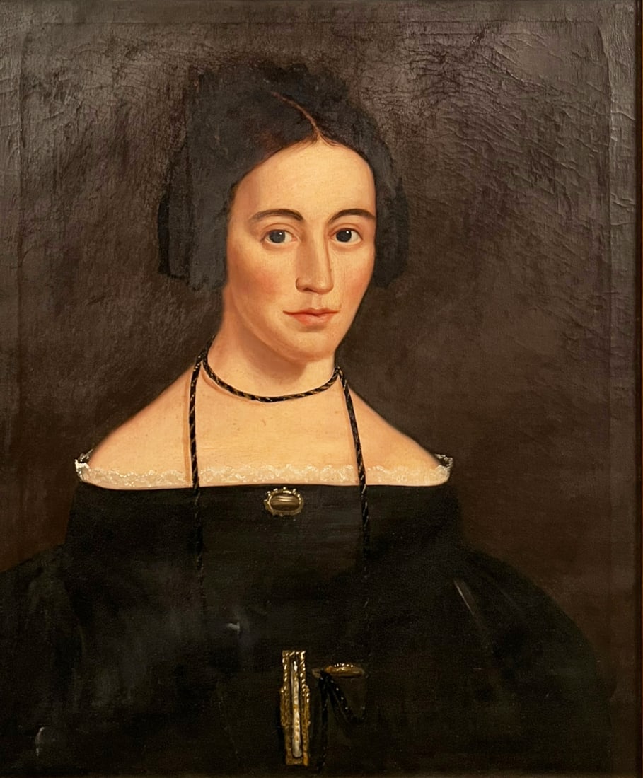 Unsigned Antique Portrait of a Woman.: This unsigned oil painting on canvas depicts a portrait of a well-dressed woman, her hair in an elaborate braid. She is shown wearing a black dress trimmed with white lace. The newly framed painting a