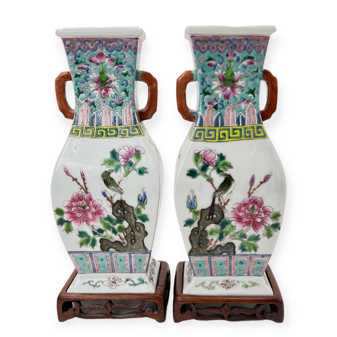 Pair of Chinese Porcelain Vases with Stands.: Both Vases look to be in Good Condition. They are marked "China" on the undersides. Each vase measures 10" tall, 4" wide, and 2 3/4" Deep. The Vases fit into the wood stands perfectly. In-house shippi