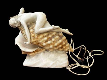 Carved Marble Signed Italian Lamp of Nude on Shell: This Art Nouveau or Art Deco Lamp is signed "Made in Italy" and "Prof. Saalii" ? on the base of the Lamp. It depicts a nude figure of a woman lying atop a shell, placing a pearl in the shell. The