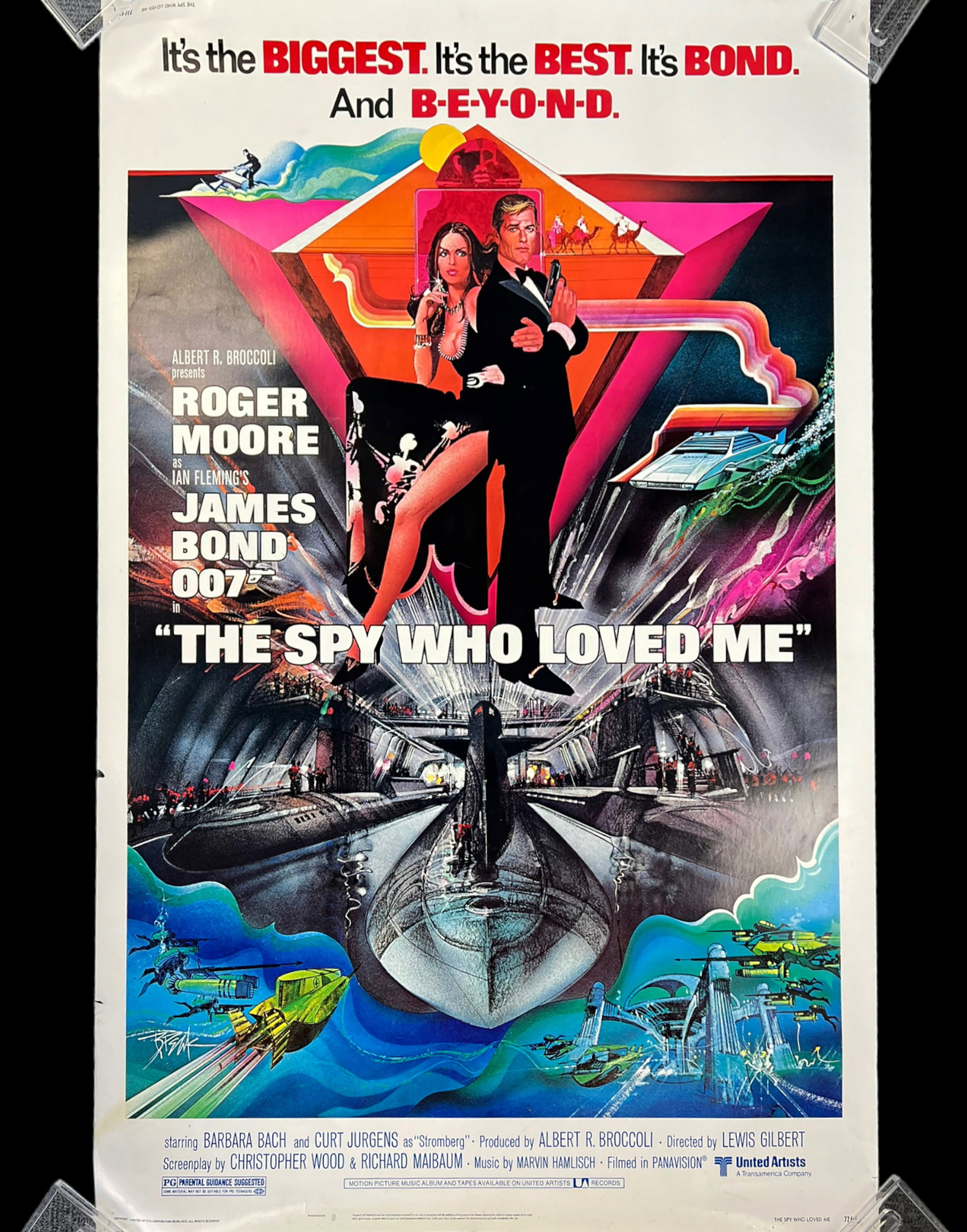 James Bond "The Spy Who Loved Me" Movie Poster.: This Movie Starred Roger Moore as James Bond. The Poster is dated 1971. There are some Tears along the edges. It has been stored rolled. The poster's Measurements are 59 1/2" x 40". In-House Shipping 