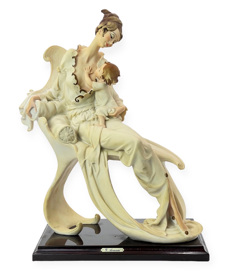Giuseppe Armani Figure, "Mother And Child".: This Giuseppe Armani art sculpture depicts a mother and child, dressed in white. It is Maker marked and signed, and measures 15" tall. In-house shipping is available. Please see our website regarding