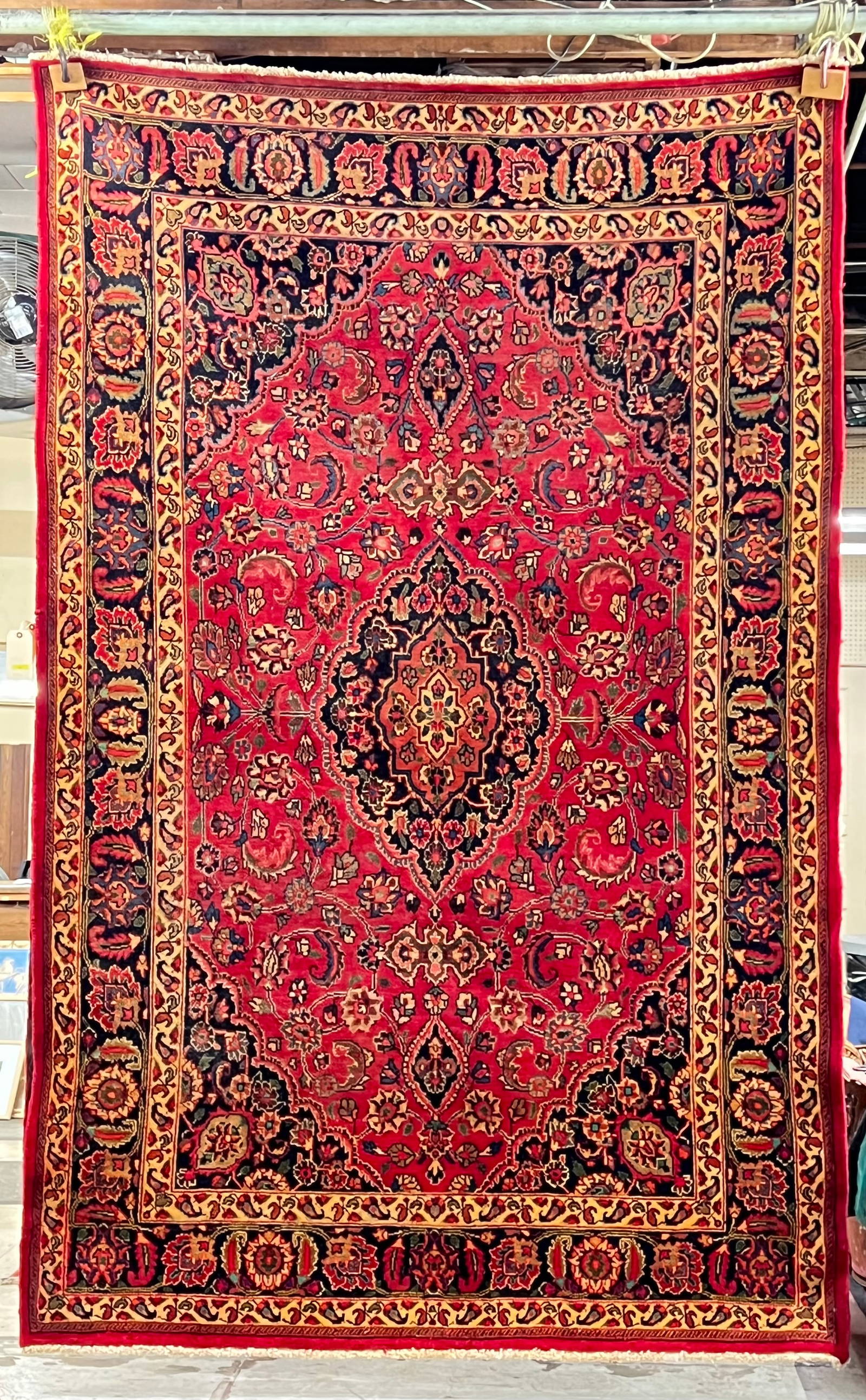 6' 7" X 10' 3" Red Field Oriental Rug. Auction