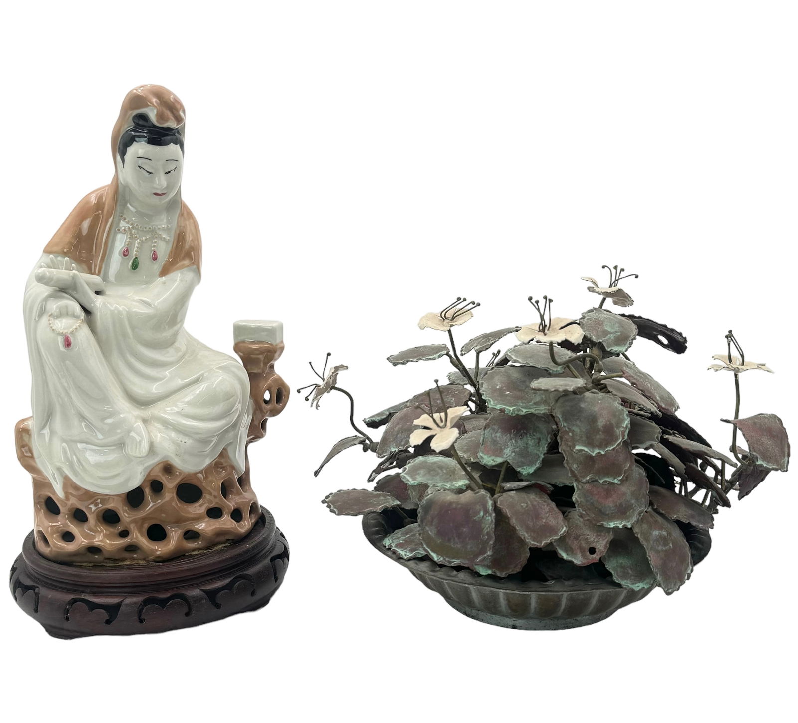 2 Pcs.: Guan Yin Figure & Metal Flower w/Plate.: The Plate is not Attached to the Floral Arrangement. The Floral Arrangement has much oxidation - we are guessing it is copper. The Guan Yin Figure is Porcelain, and is attached to a Carved Wood Base.