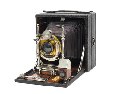 Kodak No. 3 Series C Eastman Plate Camera.: This is a beautiful 3 1/4 x 4 1/4 field camera, made from wood and leather. It comes with one holder for plates, and one holder adapted for film packs. The camera folds in and out properly. The shutte