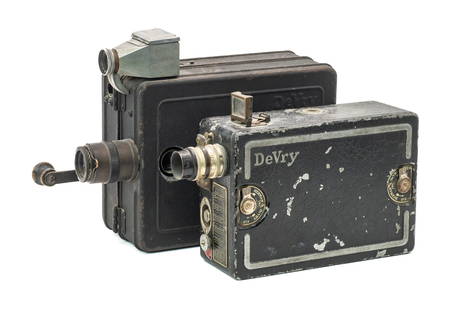 Lot of Two DeVry Movie or Film Cameras.: This lot is comprised of a DeVry Standard 35mm camera, as well as a DeVry 16mm camera. The Devry Standard has been modified with a single frame advance and a waist level finder. It has a Carl Zeiss Te