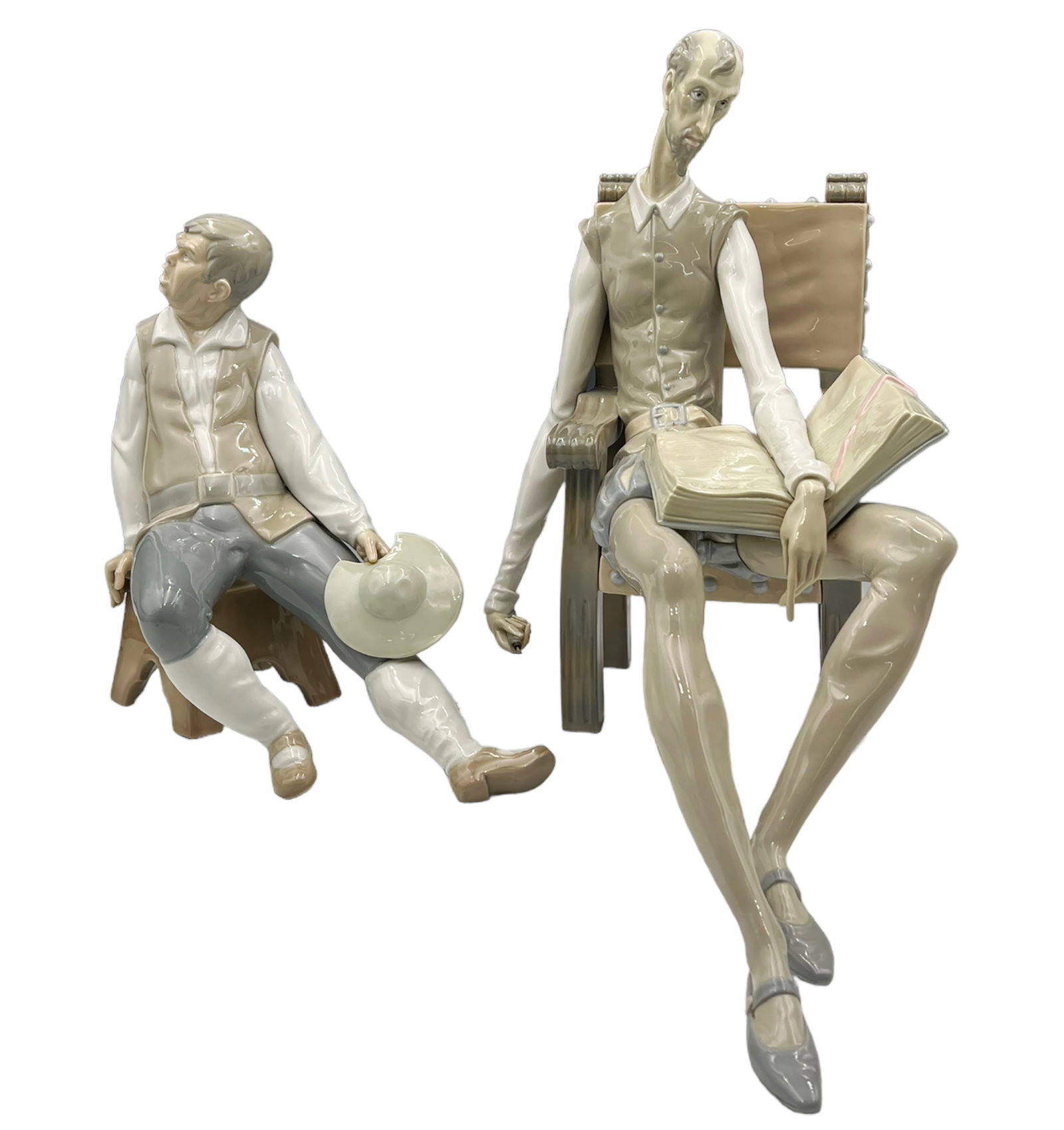 Lladro Don Quixote & Sancho Panza Figurines.: This lot includes a Don Quixote porcelain figurine and a Sancho Panza porcelain figurine, both made by Lladro. They are each marked on the underside. Don Quixote appears to be missing most of his swor