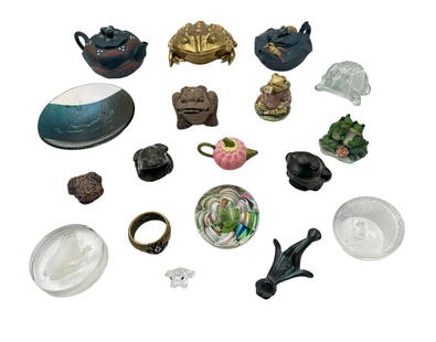 Large Lot of Frog Themed Items.: The lot includes a couple of clay teapots, a tiny Swarovski crystal frog, a Jay Strongwater napkin ring with a rhinestone frog on it, three frog paperweights (one signed Joe St. Clair), etc. - The lar