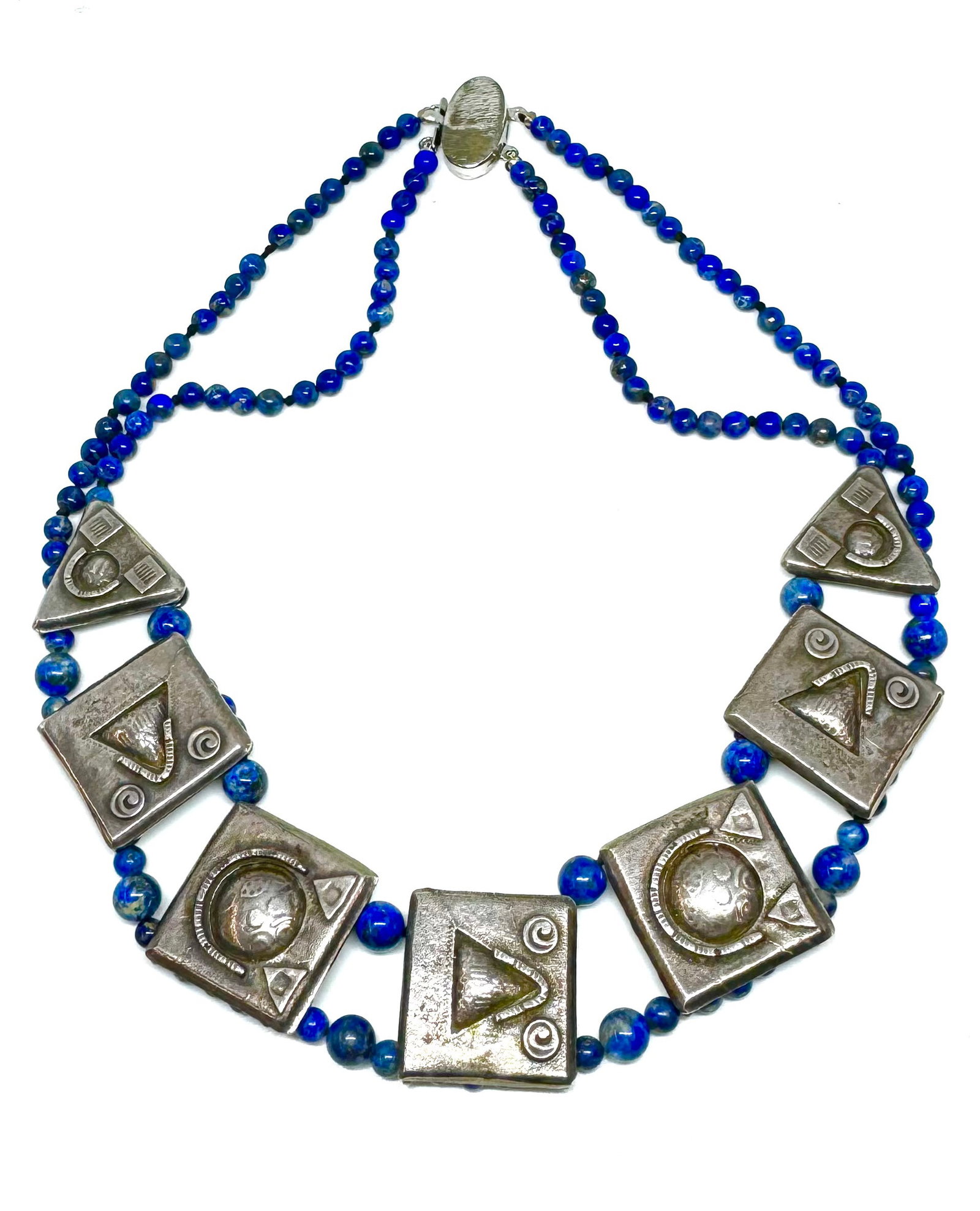 Sterling Silver & Lapis Lazuli Necklace or Choker.: The necklace measures 15 1/2" long and 3/4" wide. The clasp has some uneven tarnish on its bottom half. The necklace weighs 2.115 troy ounces, including the lapis beads. In-House Shipping is Available