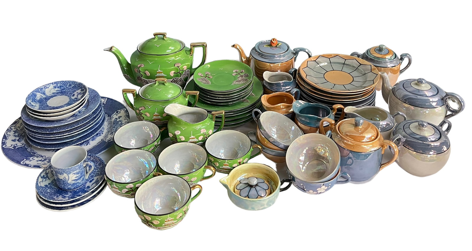 Lot of Vintage Japanese China- Lusterware, etc.: The Lot includes teapots, cups, saucers, creamers, sugar bowls, and more. The green set has Moriage images of Japanese scenery. Overall, the lot looks to be in Good cosmetic condition. In-House Shippi
