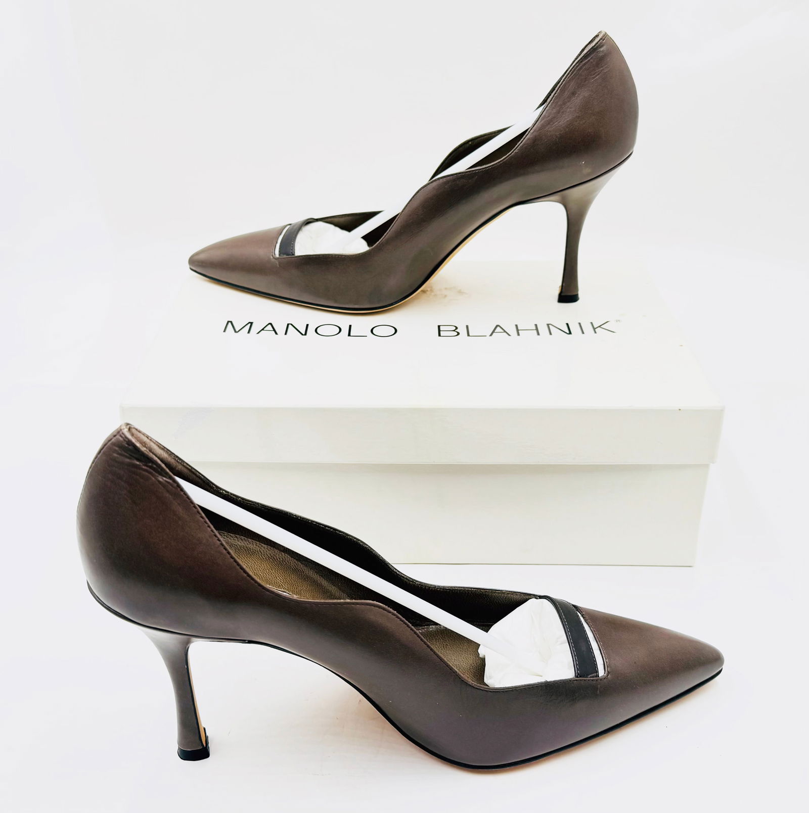 Pair of Taupe High Heels- Manolo Blahnik.: Possibly vintage. They are marked, "Manolo Blahnik", with a matching shoe box. There is no receipt included. Both shoes look to be in Nice condition. They are European Size 40". The box has some Scrat