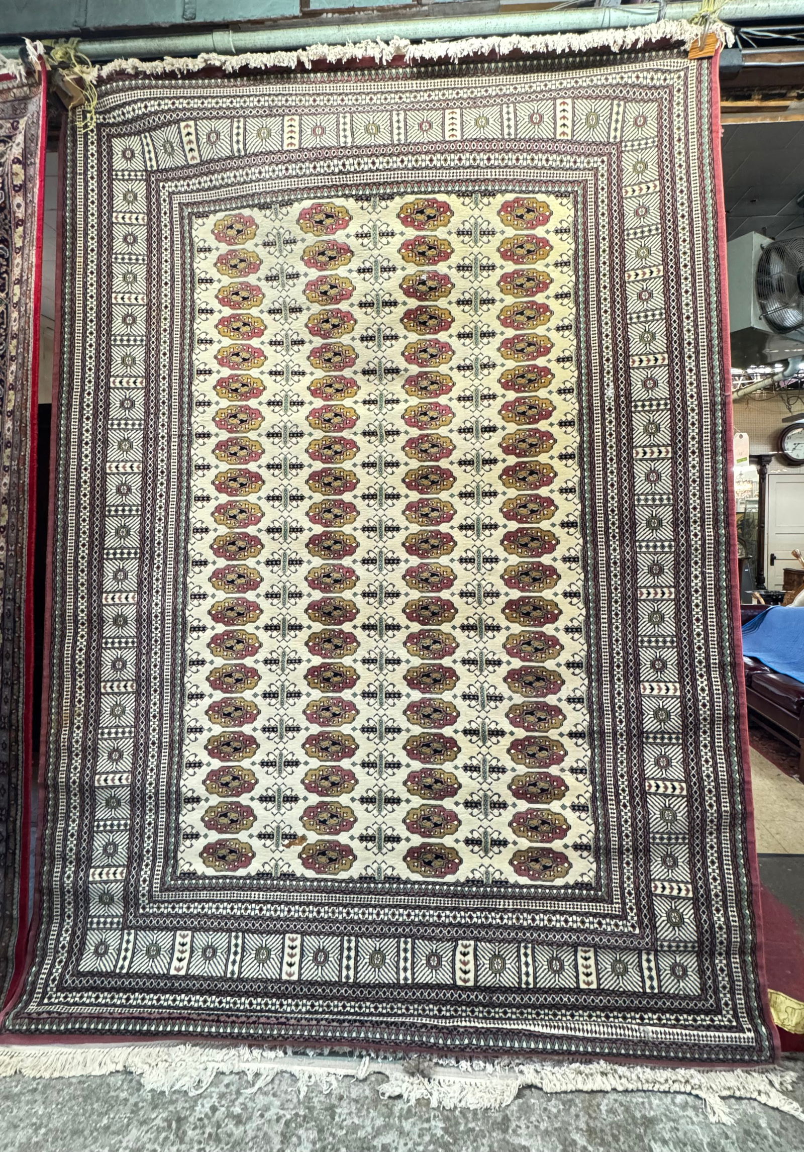 Signed Hali Cream Field Bokhara Pattern Rug. (1 of 3)