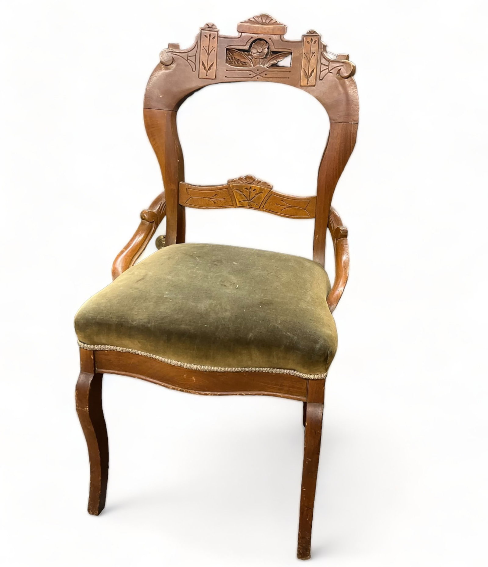 Carved Victorian Side Chair.: The chair has mohair upholstery, and a cut-out rounded style back. The upholstery is loose on the underside of the chair, and one of the legs is wobbly. It measures 18" wide, 15" deep, and 36" tall. T