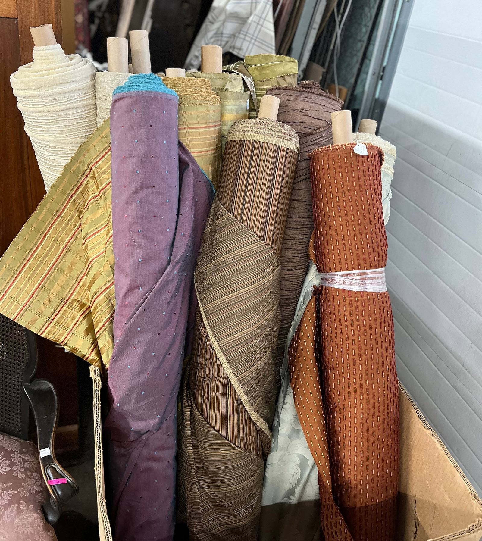 Lot of Fifteen Bolts of Fabric.: This is the perfect lot for an upholsterer. The bolts all quite full, and seem to be in good condition. The bin is not included. The bolts are each 58" long. Third-Party Freight Shipping or Personal P