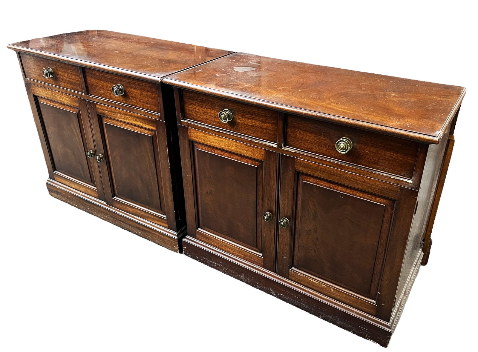 Pair of Mahogany Cabinets.: These cabinets or servers each have two upper drawers and low lower doors with an adjustable shelf inside. Both have their original brass hardware. They are in good overall conditionk, with some scrat