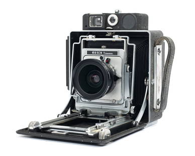 Busch Pressman Camera w/ Schneider Super Angulon.: This is a Busch Pressman 4x5 camera body with a Schneider Super-Angulon 90mm f/8 Lens. The camera is in good condition, with some wear to the leather covering. The rangefinder works, but the patch is