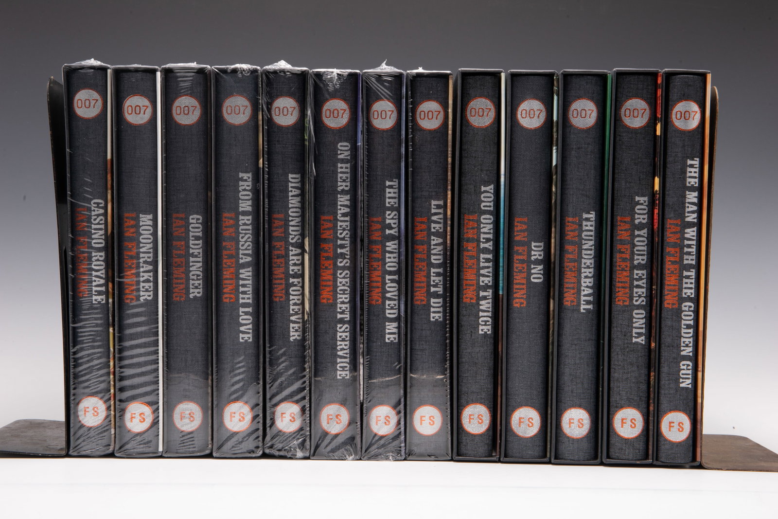 Set of 13 Folio Society James Bond Books.: They are hardcover books, featuring Ian Fleming's iconic spy hero. 8 are still Sealed. The Lot looks to be in Very Nice condition. The books include the following: "Dr. No", "Casino Royale", "You Only