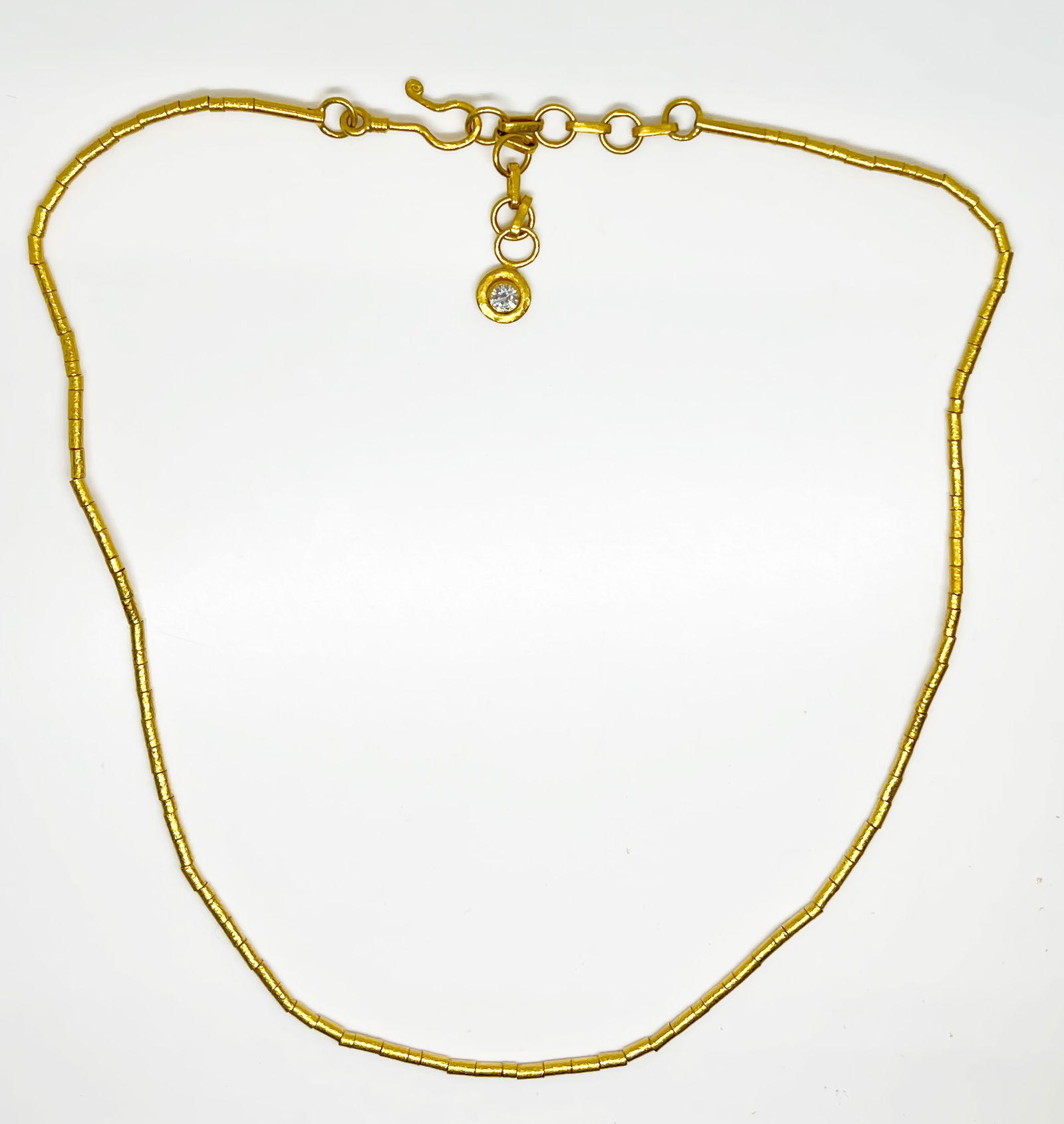Gurhan 23-24K Gold & Diamond Necklace.: This piece is marked Gurhan N5070 / 0.990. The necklace is made out of almost 24K gold textured beads, and it holds a .2 Carat (almost 4mm diameter) diamond at the end of the sizing chain. It measures