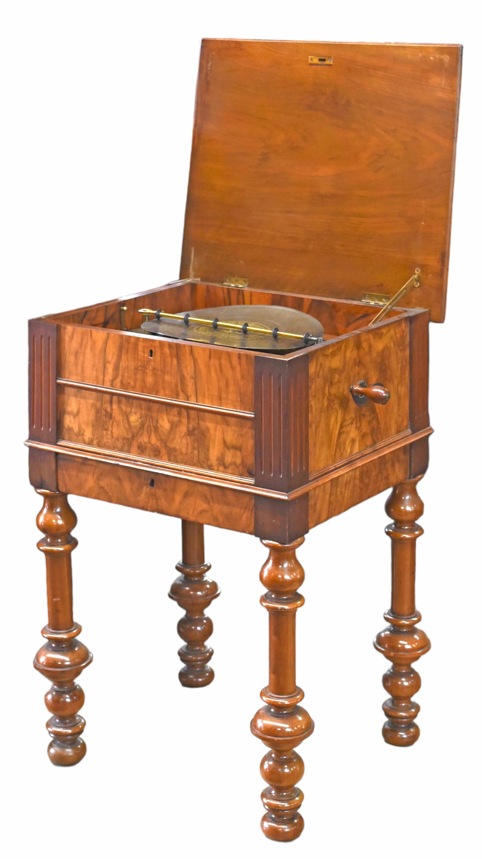 Schutz-Marke Music Box w/ 12 Metal Music Disks.: This German model looks like it could be a Symphonian, but it is not marked as such. It has a comb on either side of the spindle. The combs are in excellent condition, with no missing teeth. It is in 